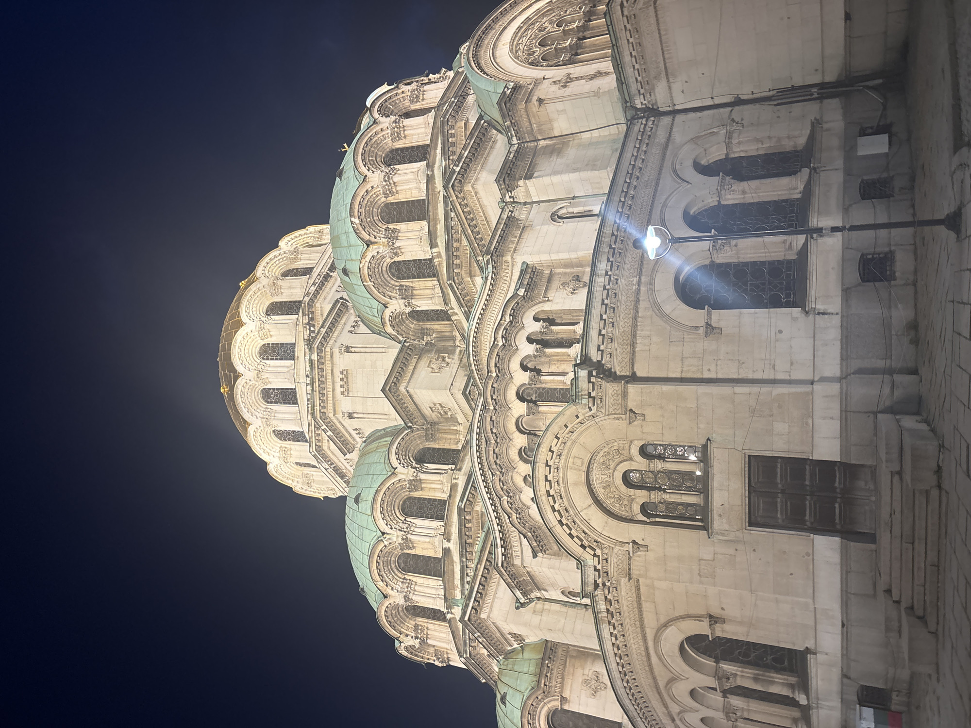 Nighttime photography session captures illuminated Sofia cathedral and buildings