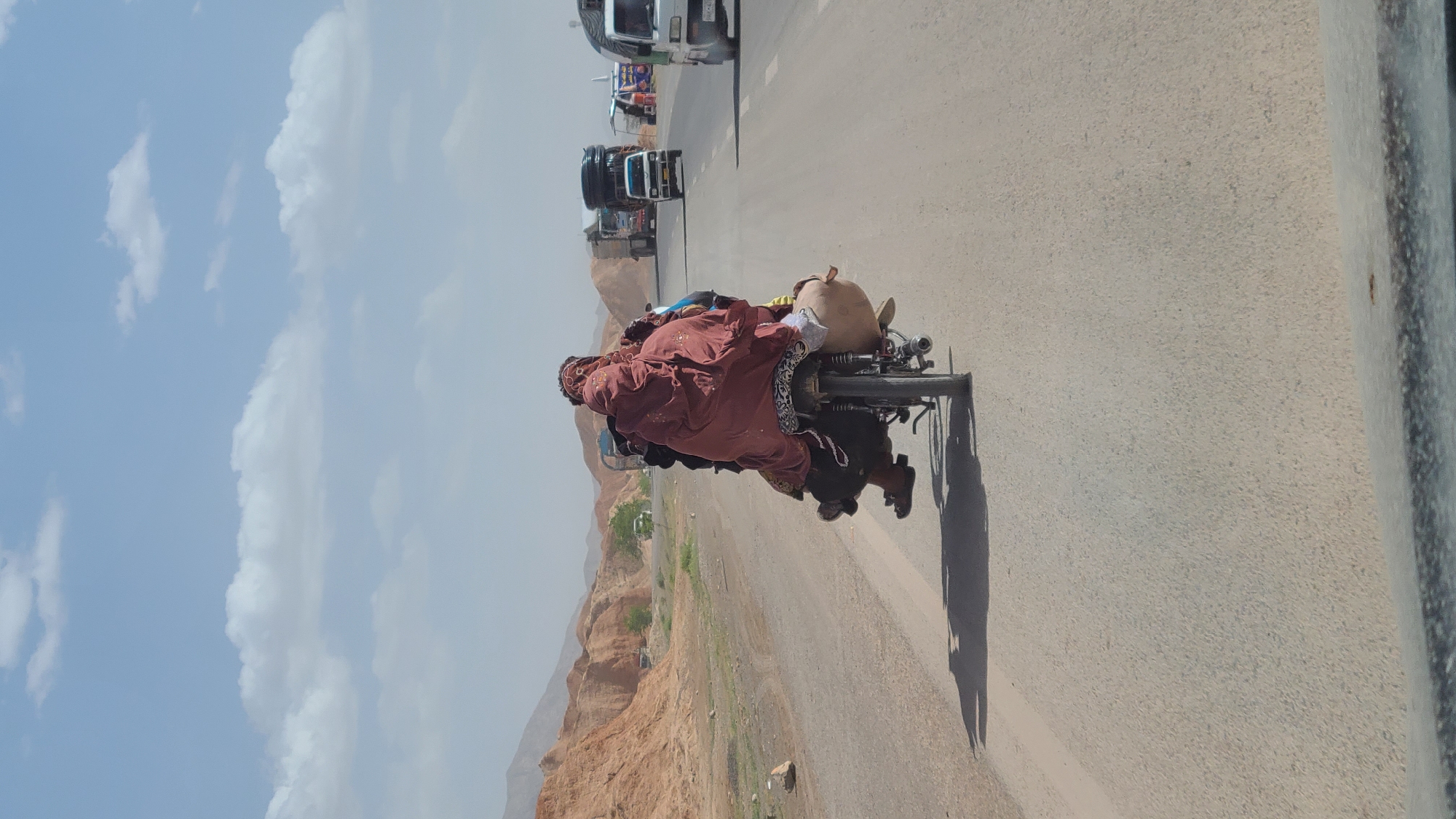 Motorcyclist in traditional dress spotted in Kuchlak, Pakistan