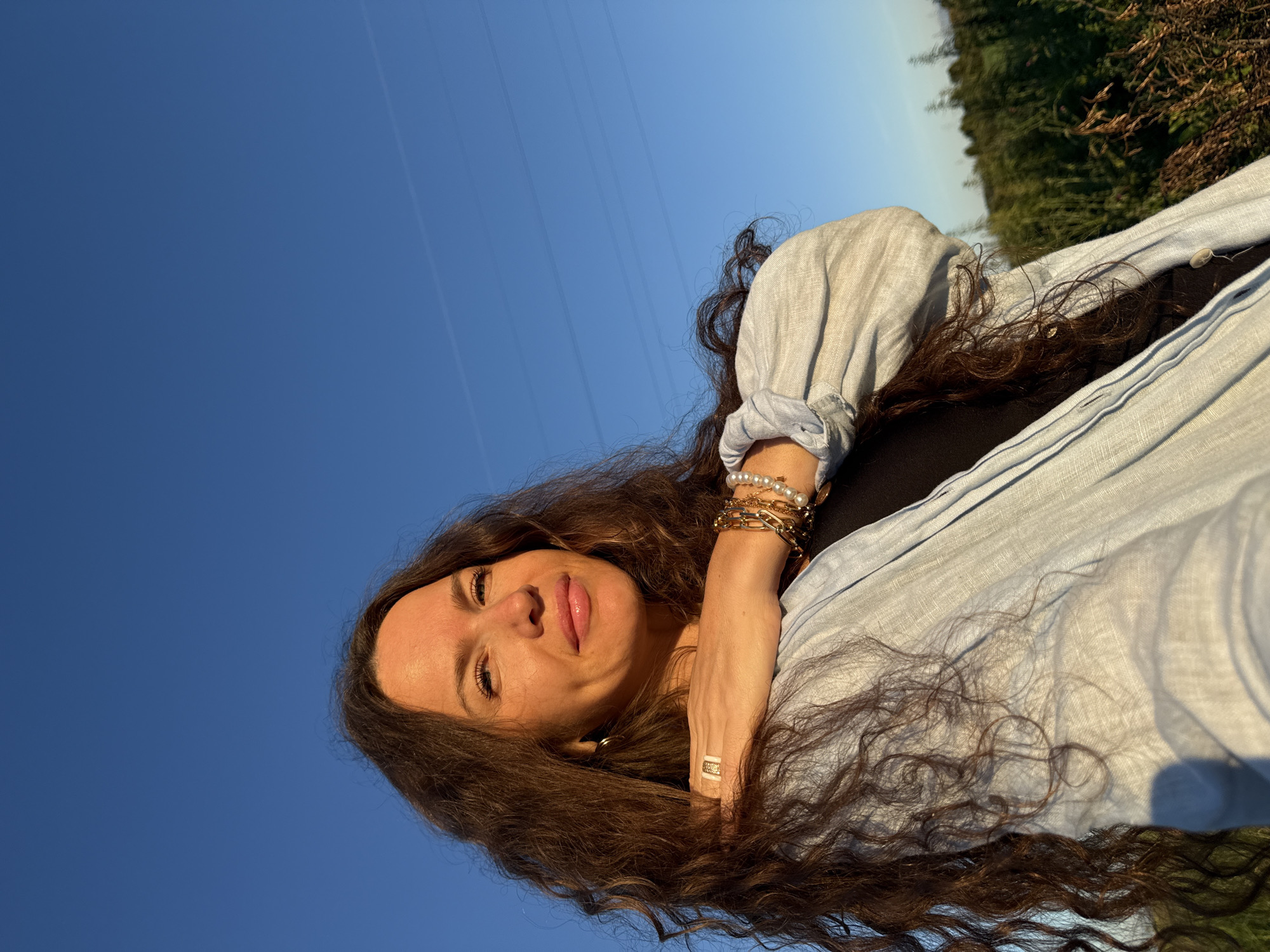 Golden hour in a Turinsk meadow, wildflowers and selfies