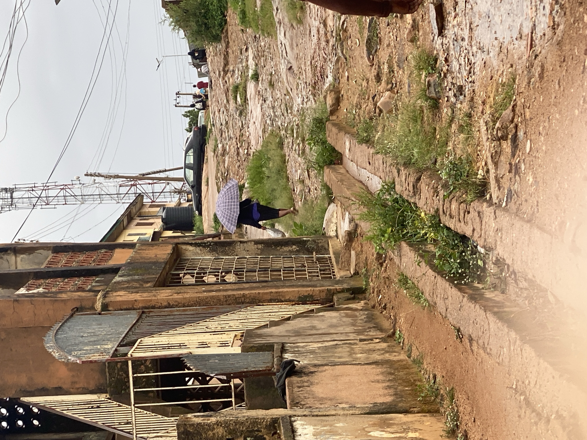 Jos neighborhood navigates muddy streets after morning rain
