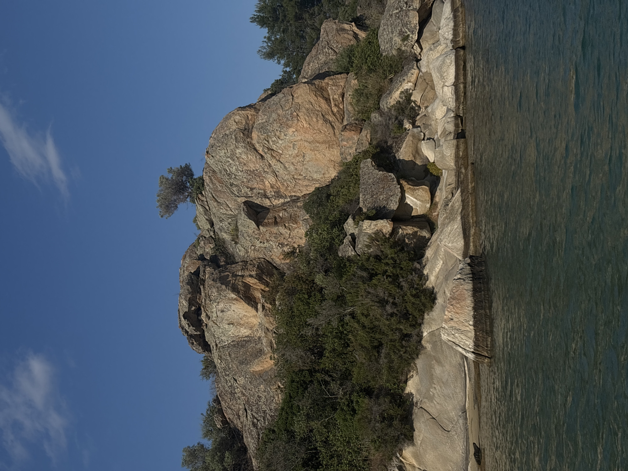 Coastal scenes documented along Sithonia's rocky shoreline and turquoise waters