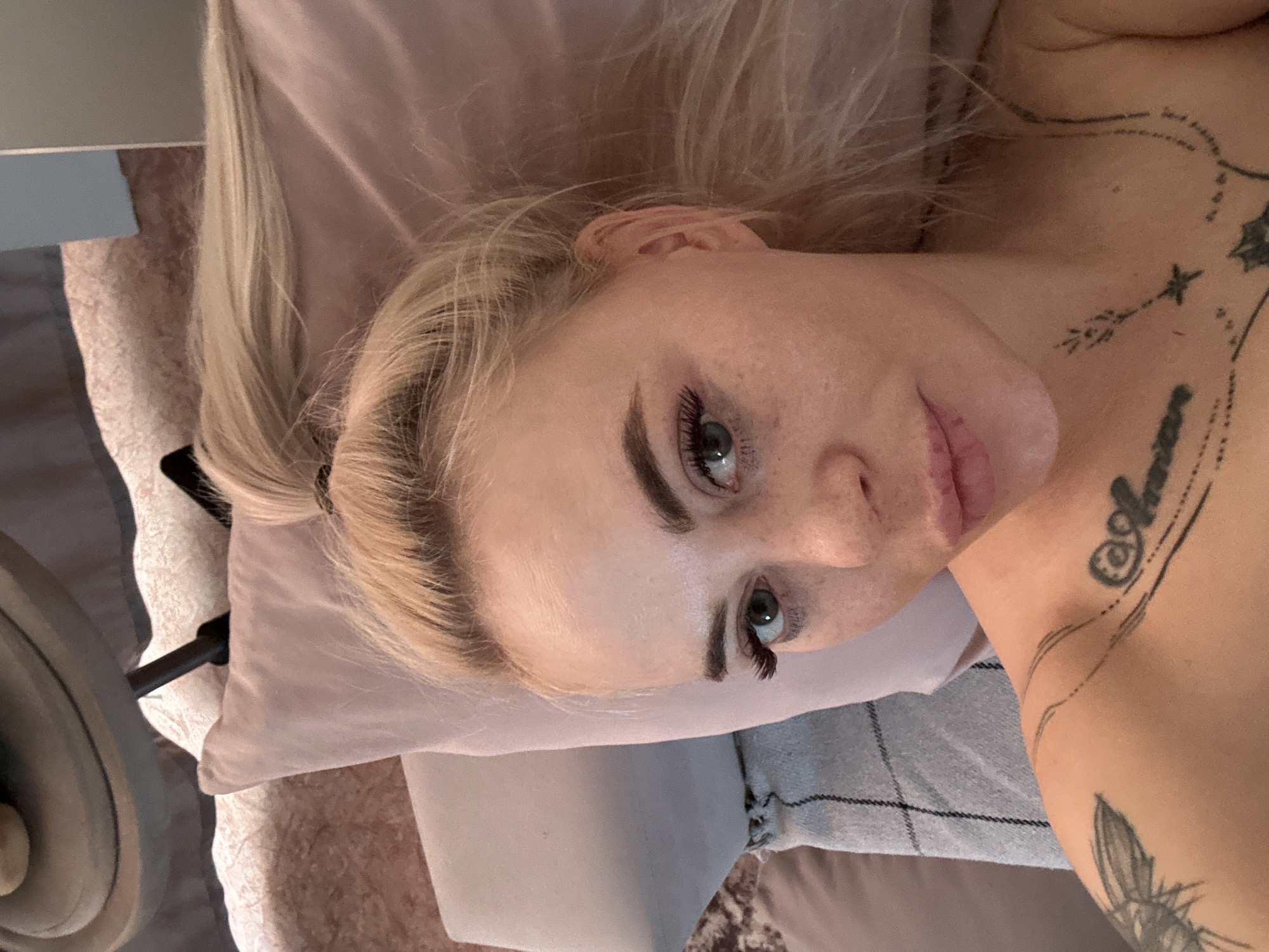 Woman rests in bedroom during early morning hours in Russia
