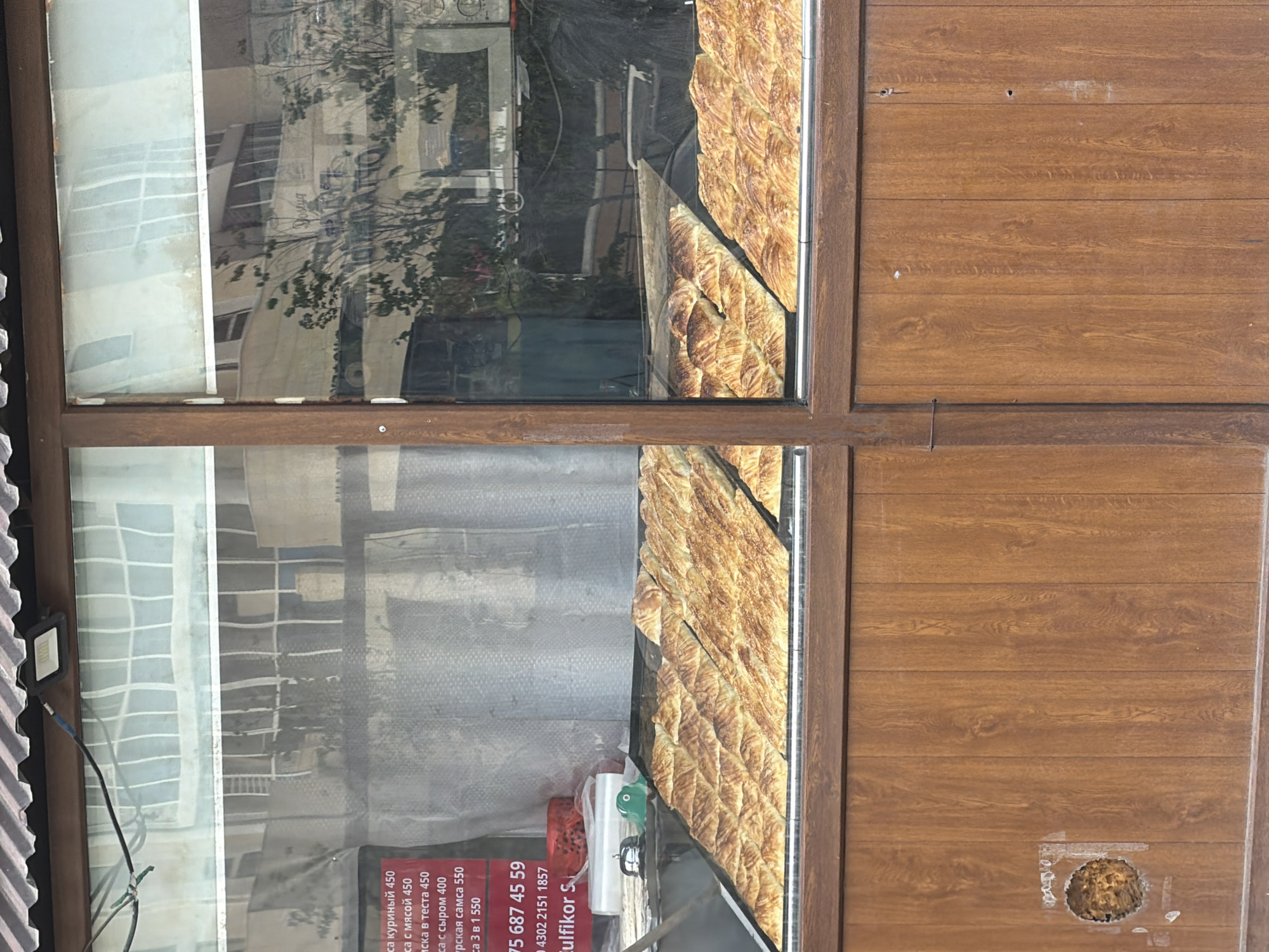 Morning street scenes captured in Astana show diverse storefront displays