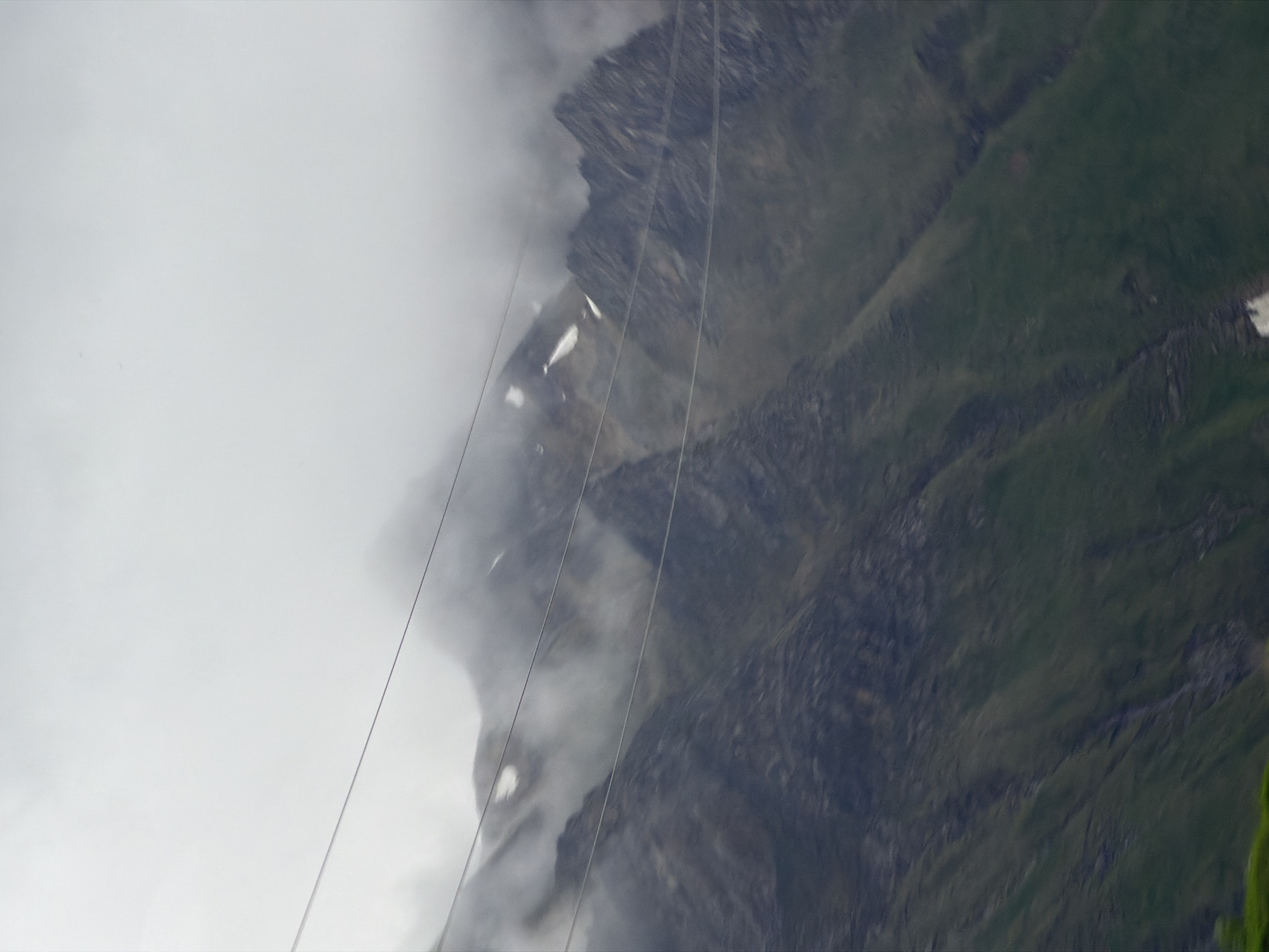 Mountain road journey through fog, livestock, and active construction