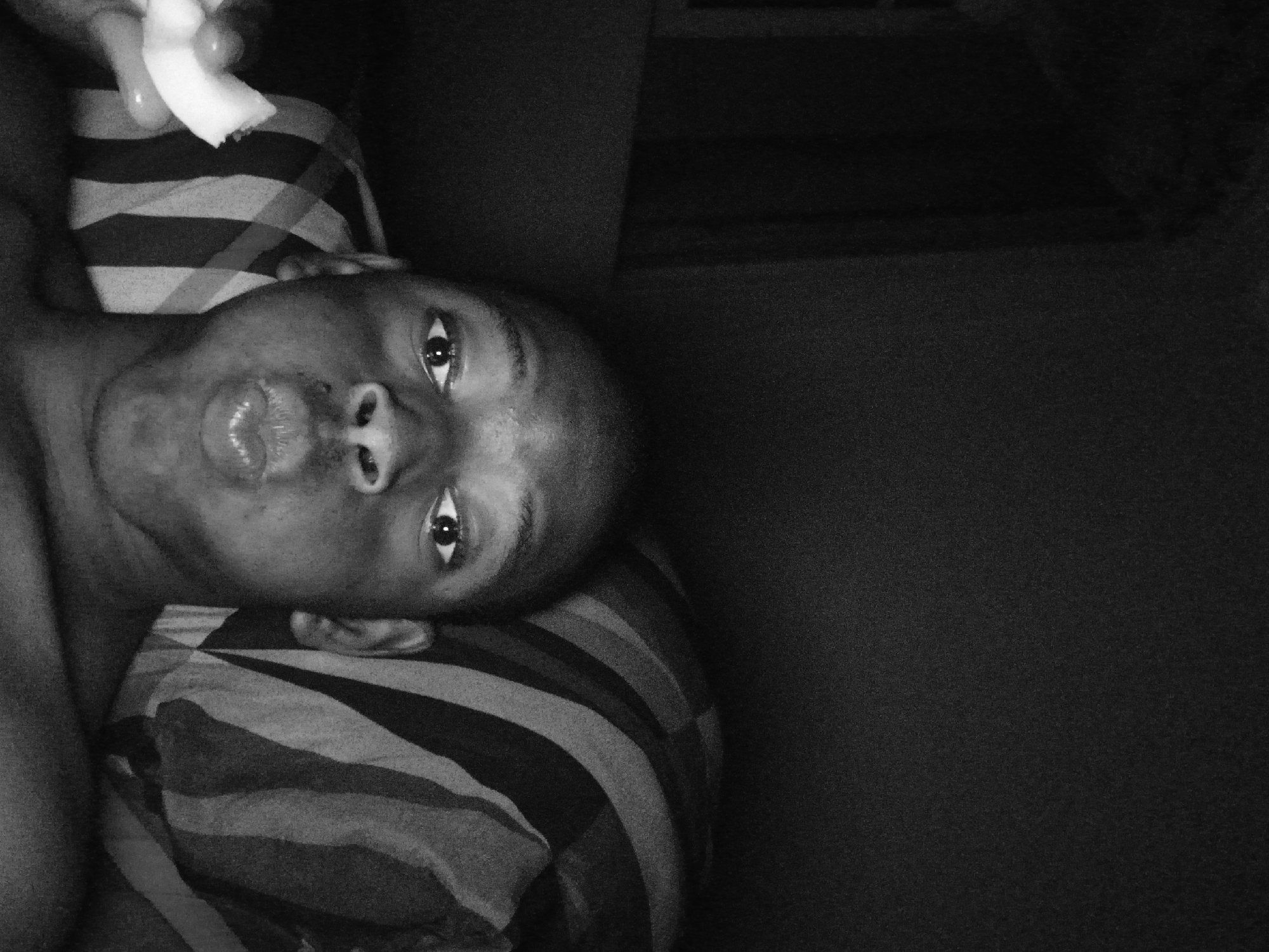 Person photographed eating in bed in Lagos