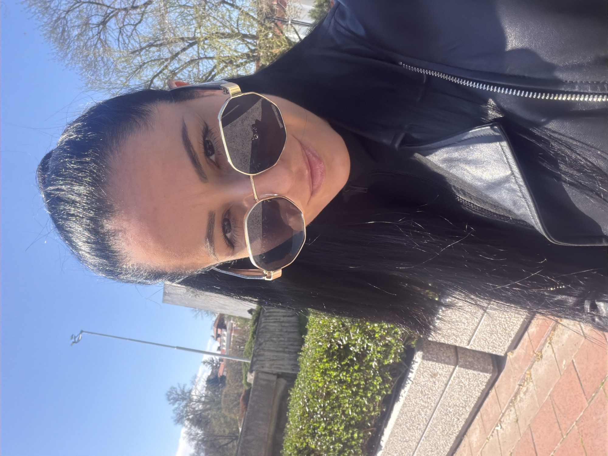 Woman Takes Selfies at Concert Hall in Pleven