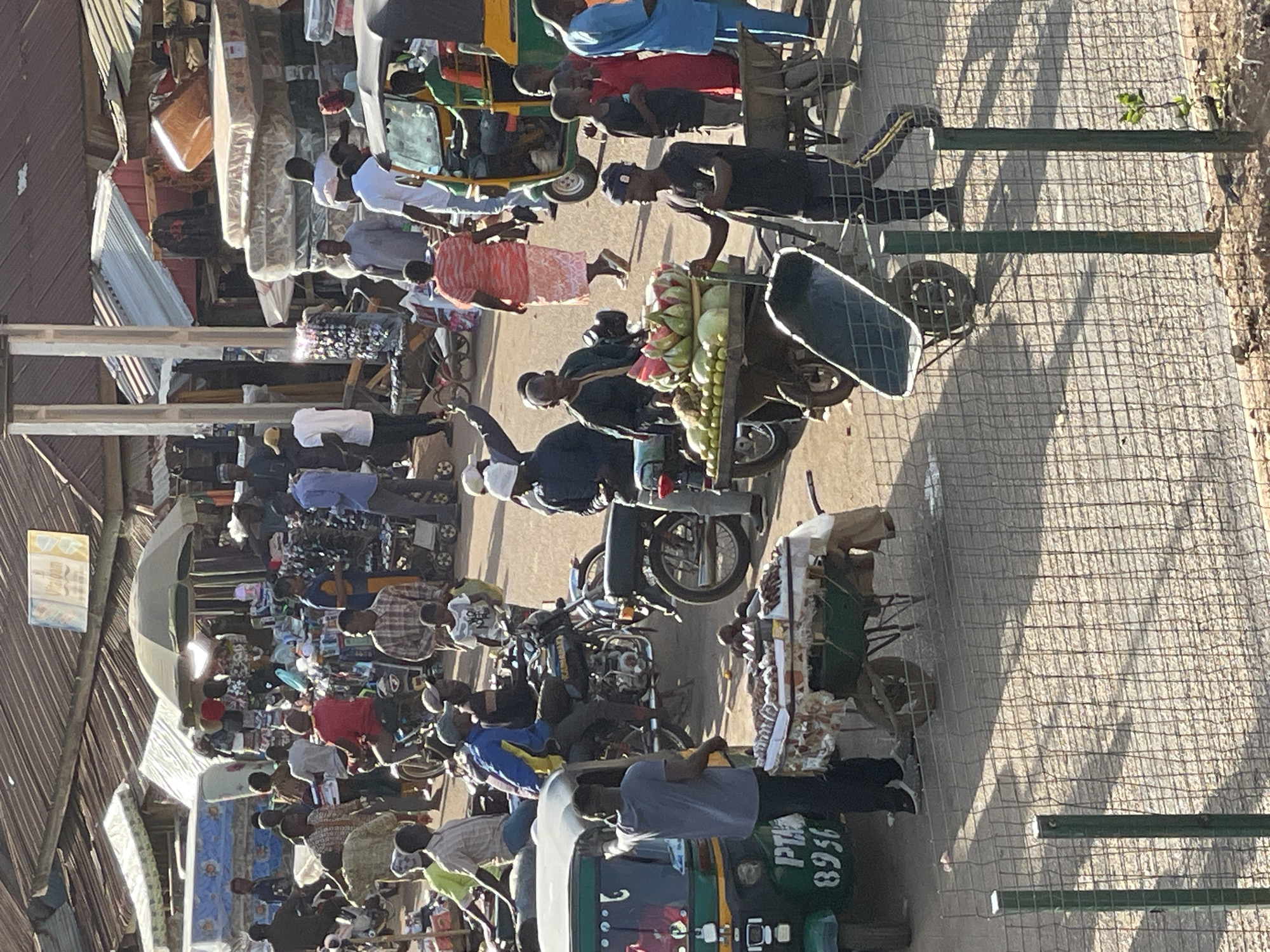 Ordinary afternoon street life documented across Bukuru, Nigeria markets