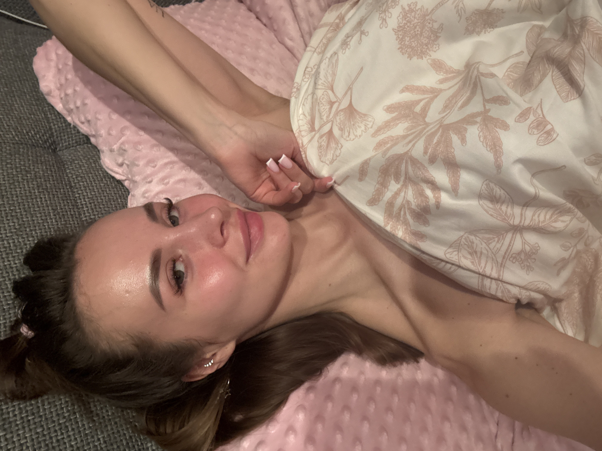 Woman rests on blanket in Kyiv