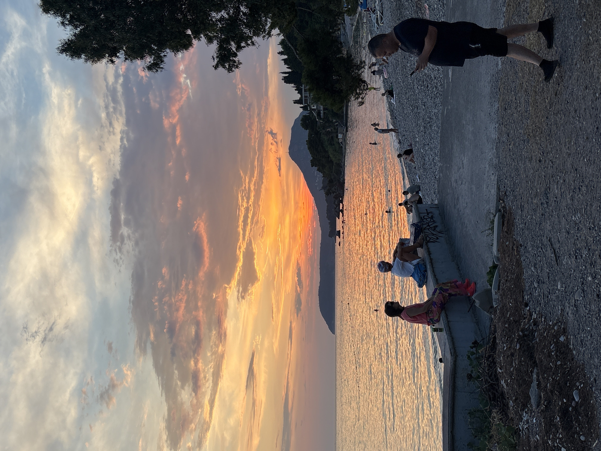Summer solstice sunset on Bar's Adriatic pebble beach
