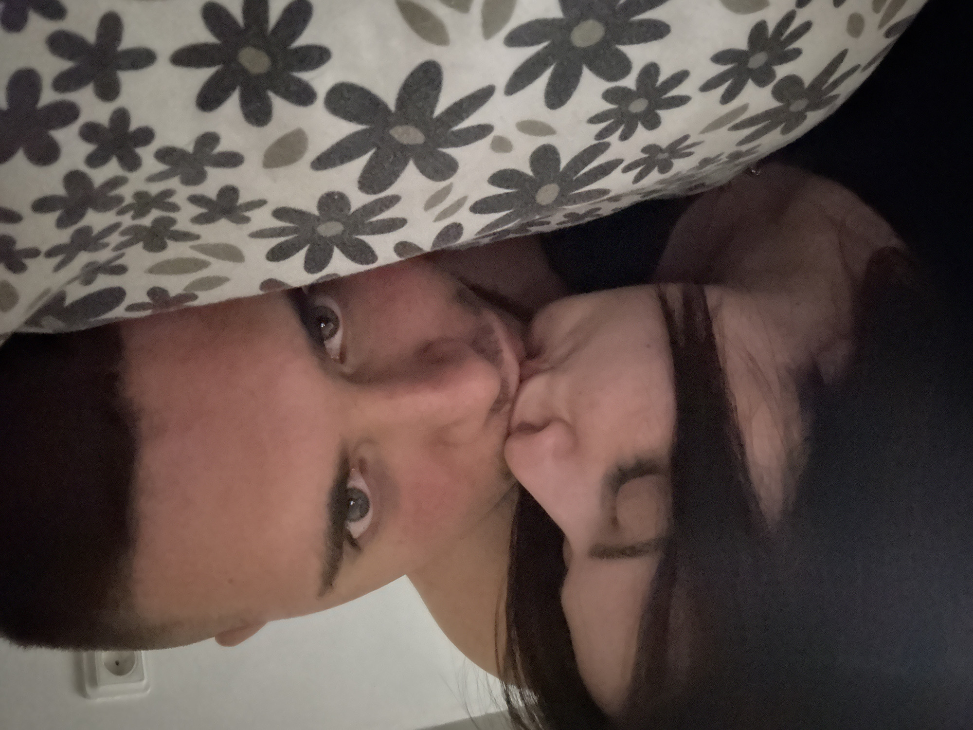 Couple and costumed French Bulldog share quiet evening in Burgas