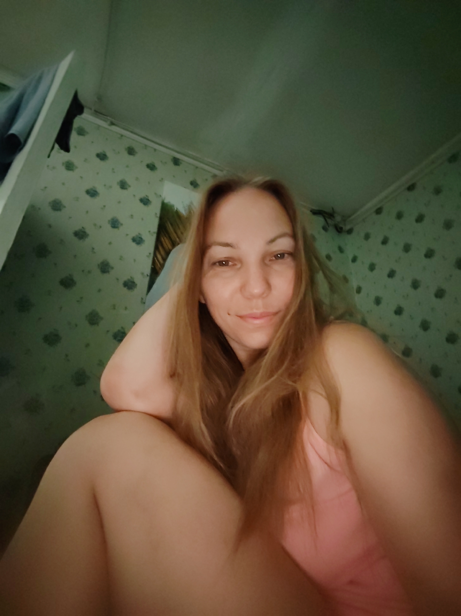 Summer morning in a Russian village garden, flowers and selfies