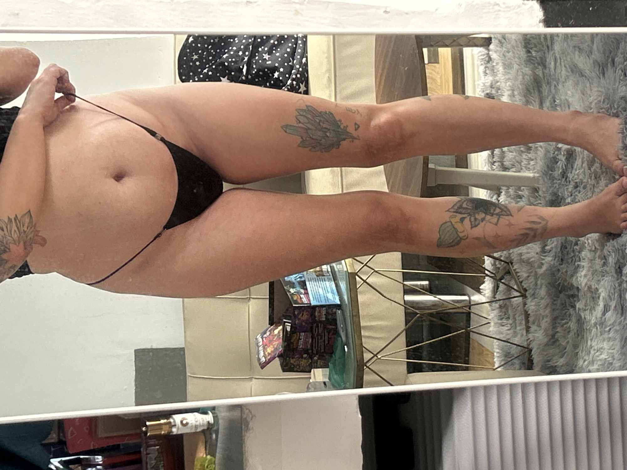 Bedroom mirror selfies showing tattoo details, Nha Trang