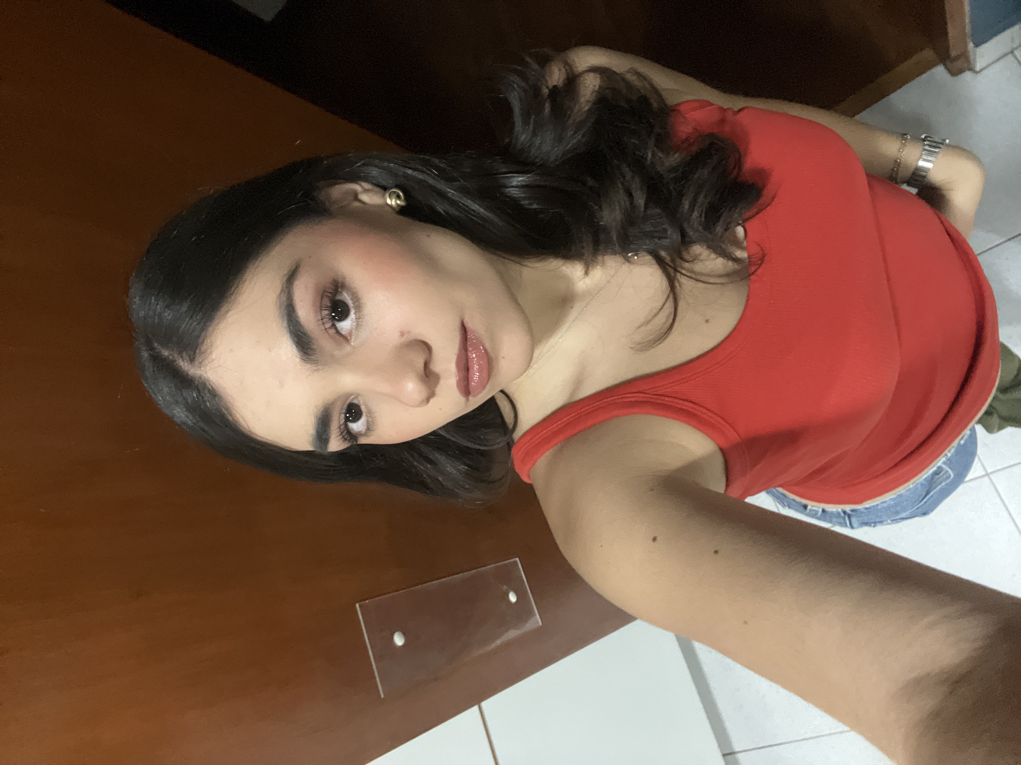 Young woman photographed indoors in Mexico City