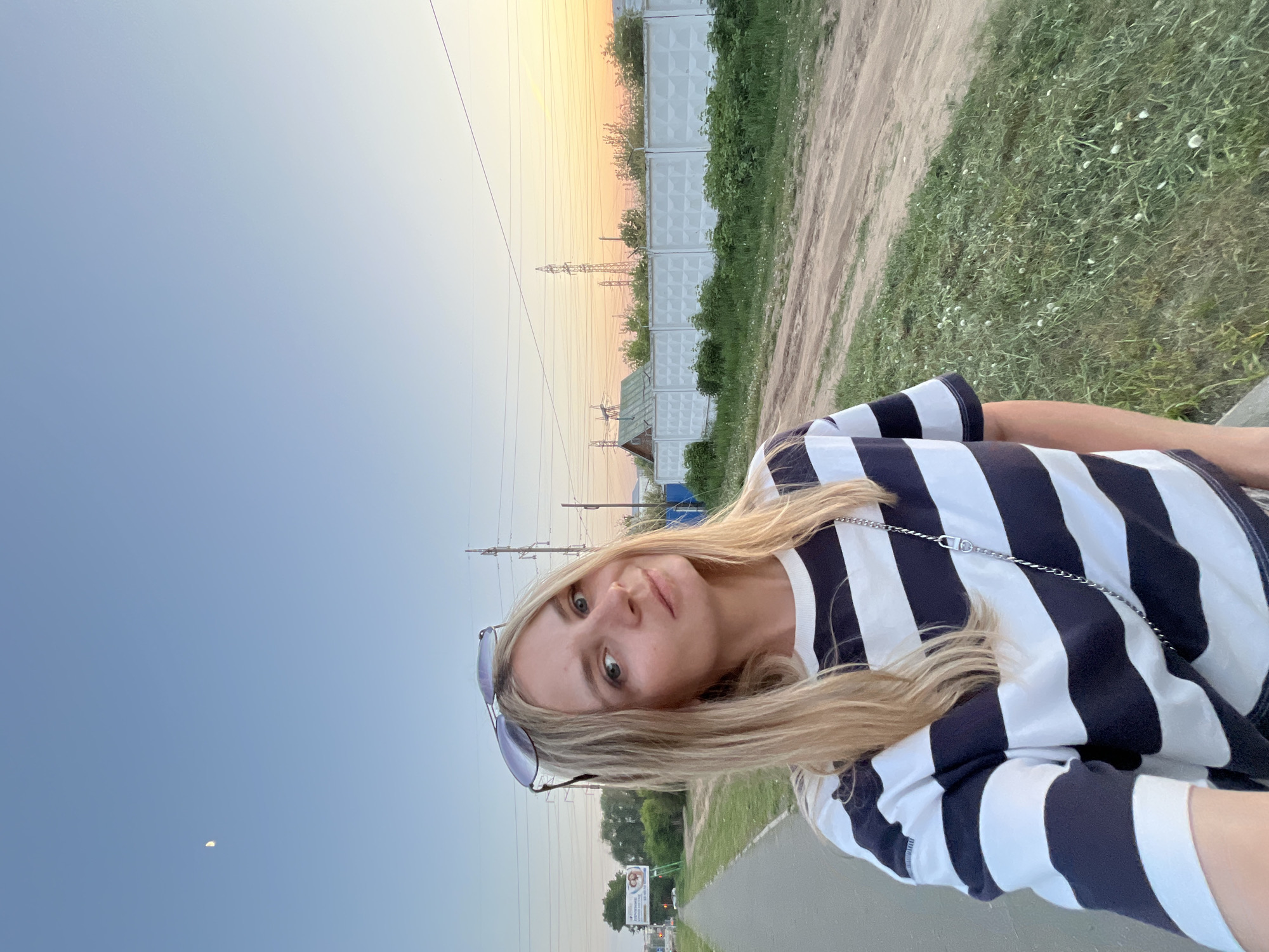 Family enjoys afternoon stroll with baby in Chaikovsky, Russia