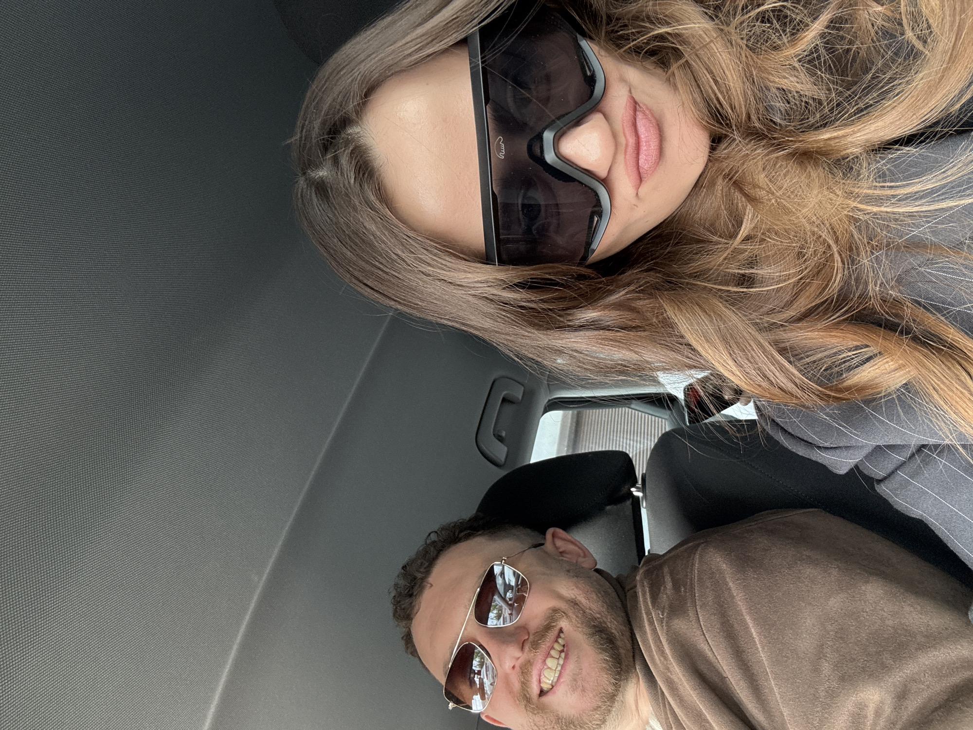 Couple takes selfie in vehicle in Krasnoyarsk, Russia