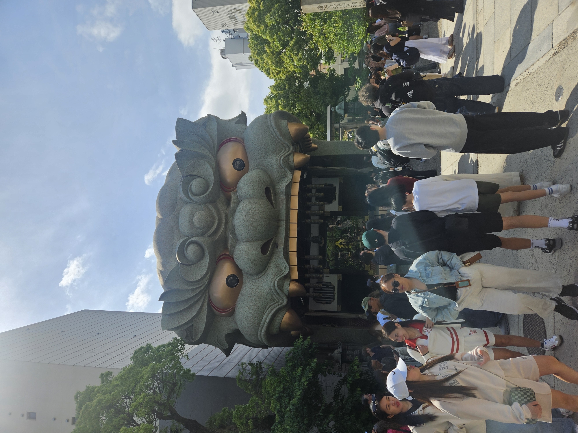 Early morning crowd gathers at Namba Yasaka Shrine, Osaka