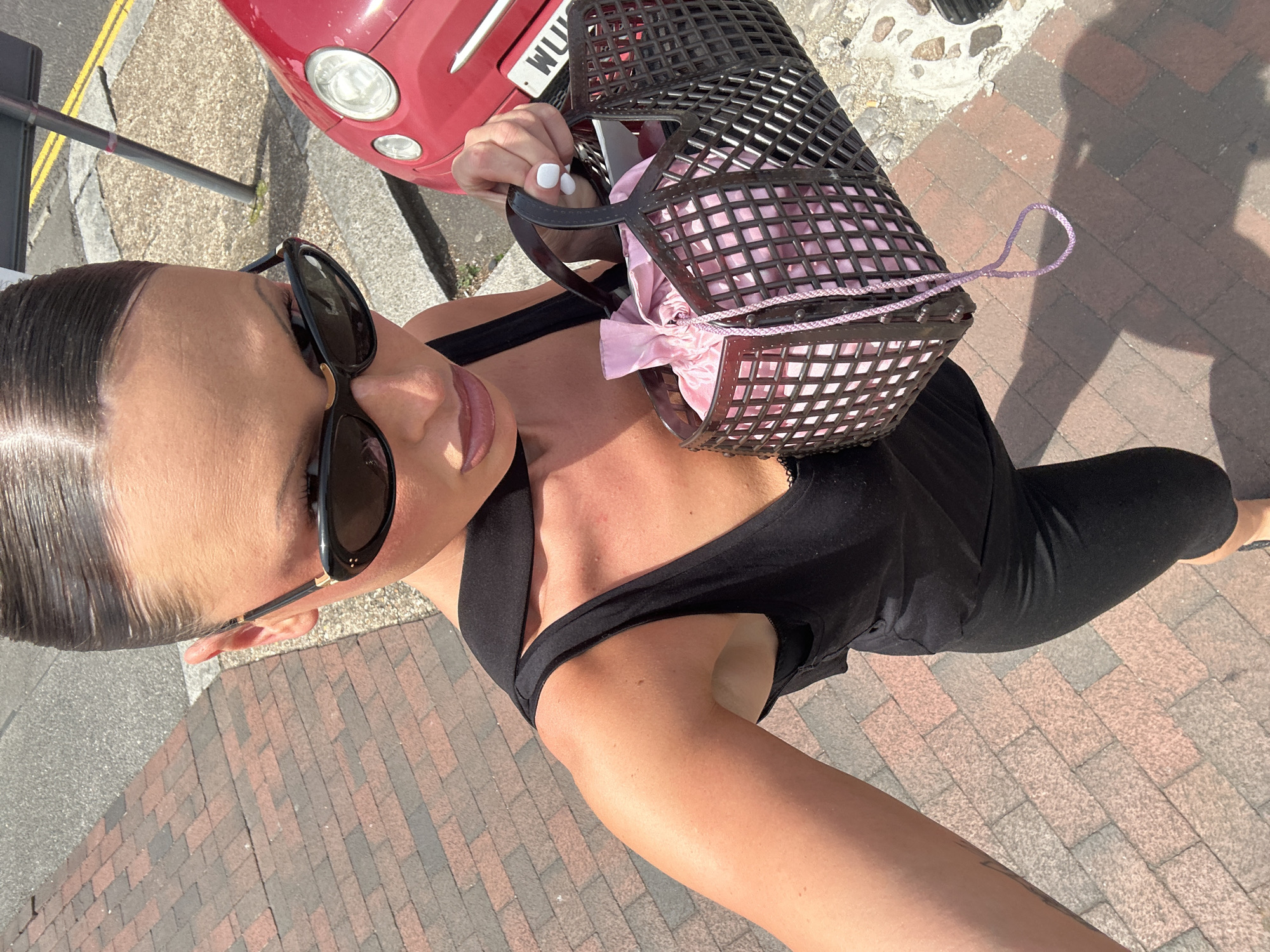 Woman in black observed on Tunbridge Wells sidewalk