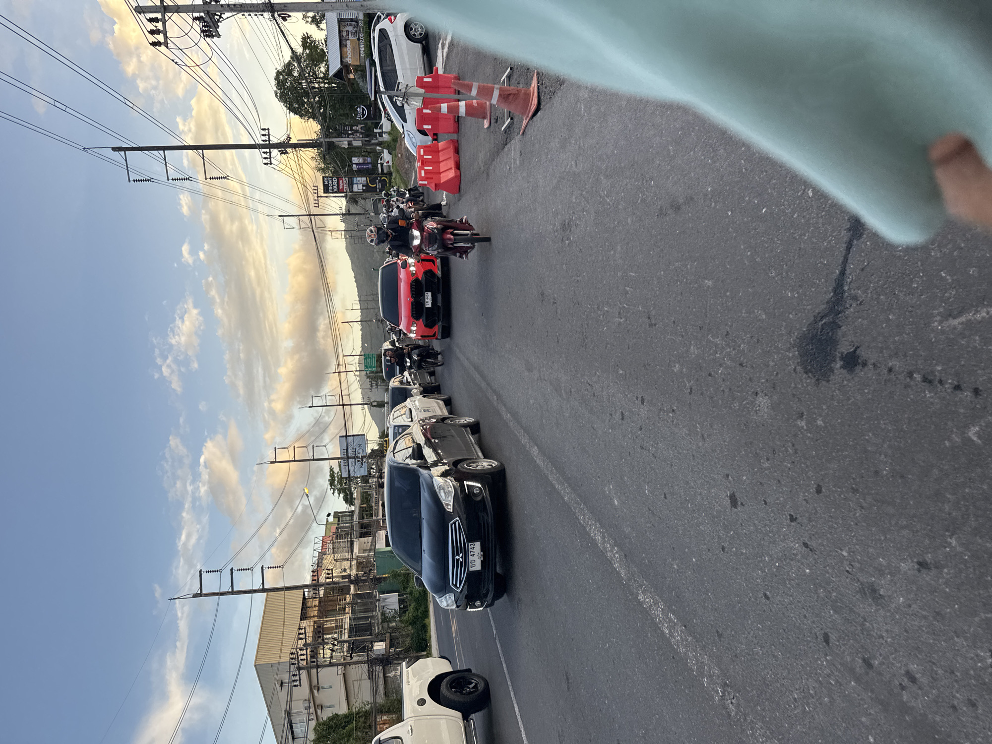 Traffic scenes documented in Wichit, Thailand including emergency ambulance