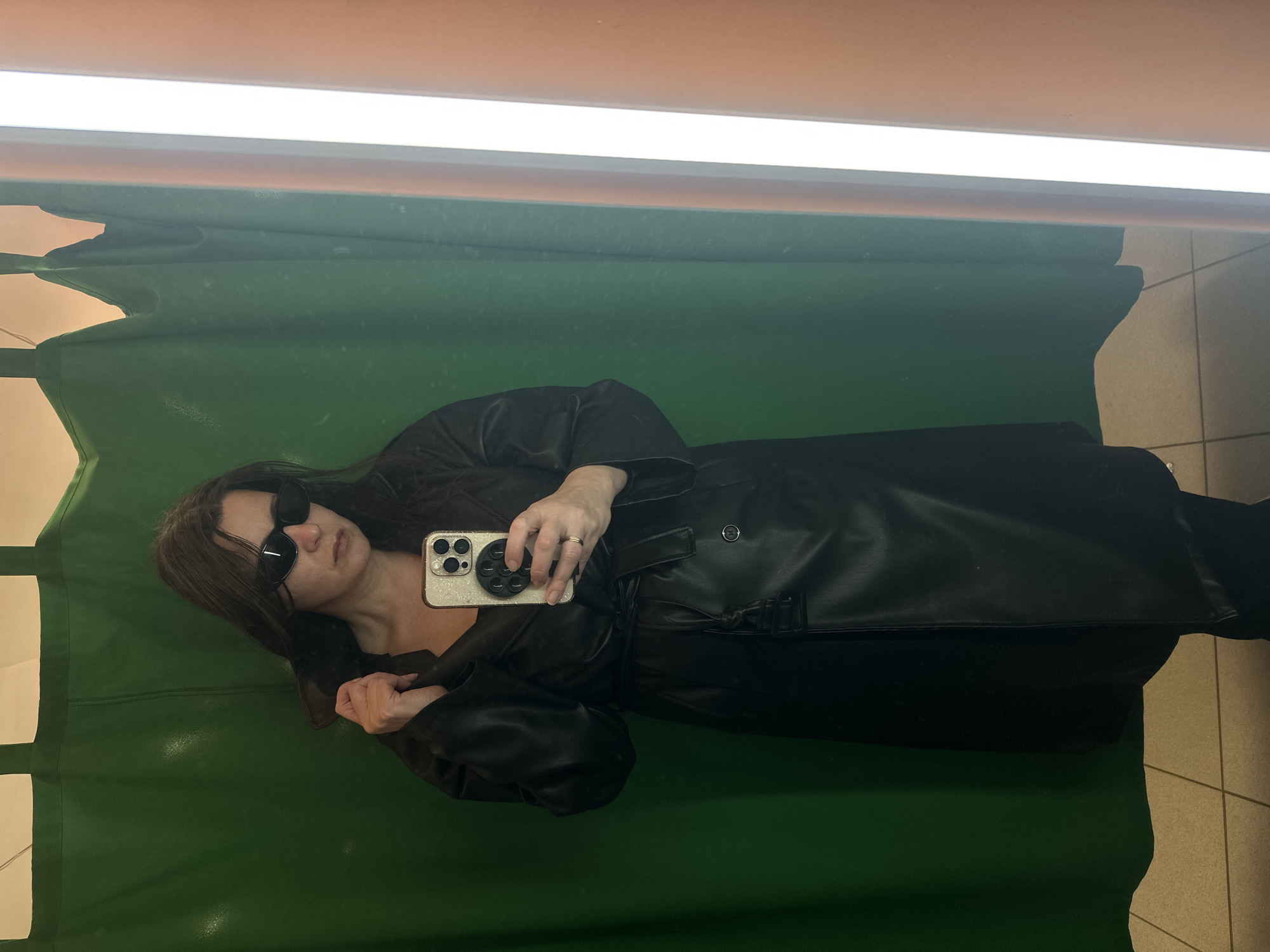 Woman takes mirror selfie in Riga changing room