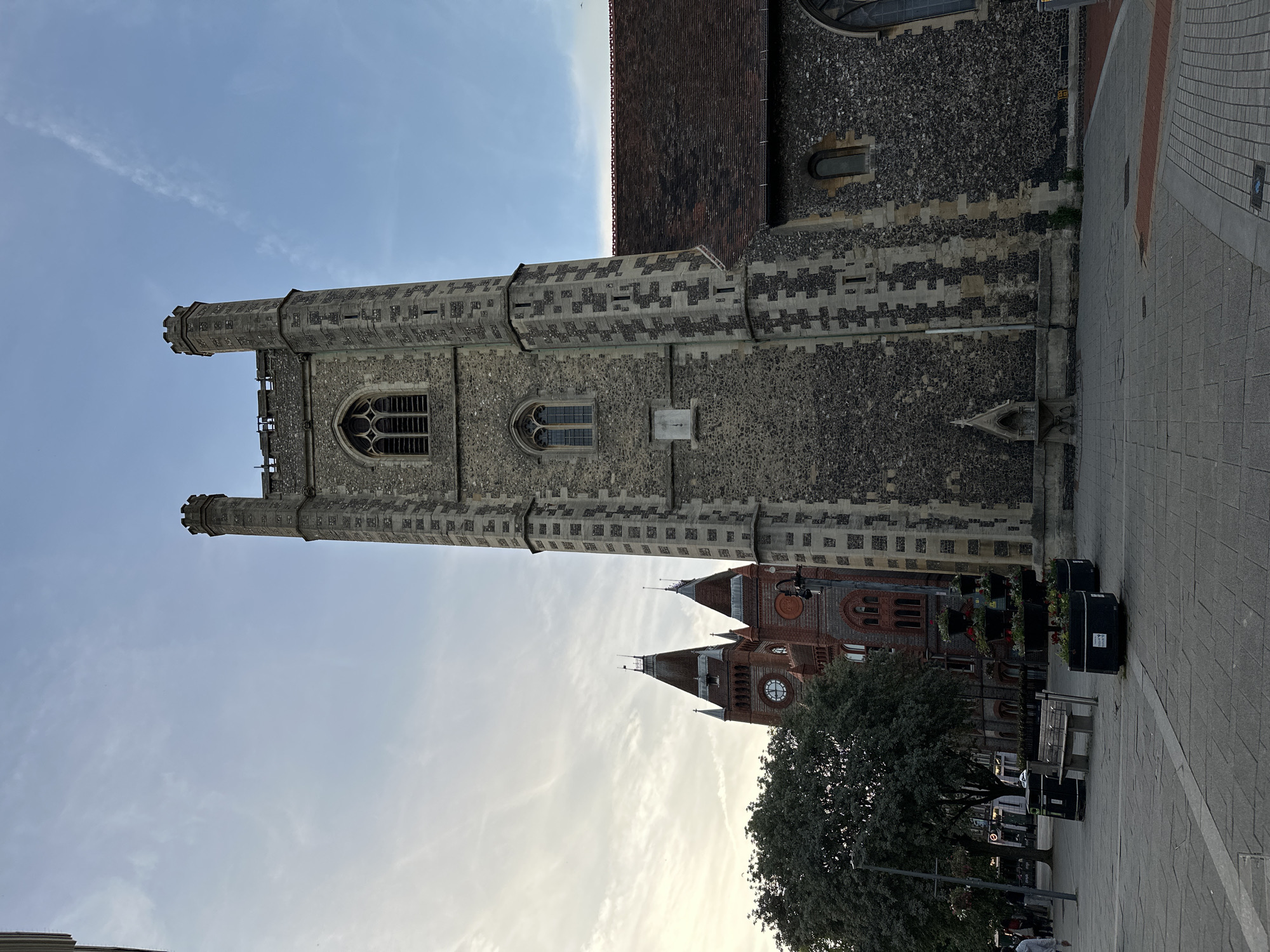 Evening stroll through historic city center with church and dining