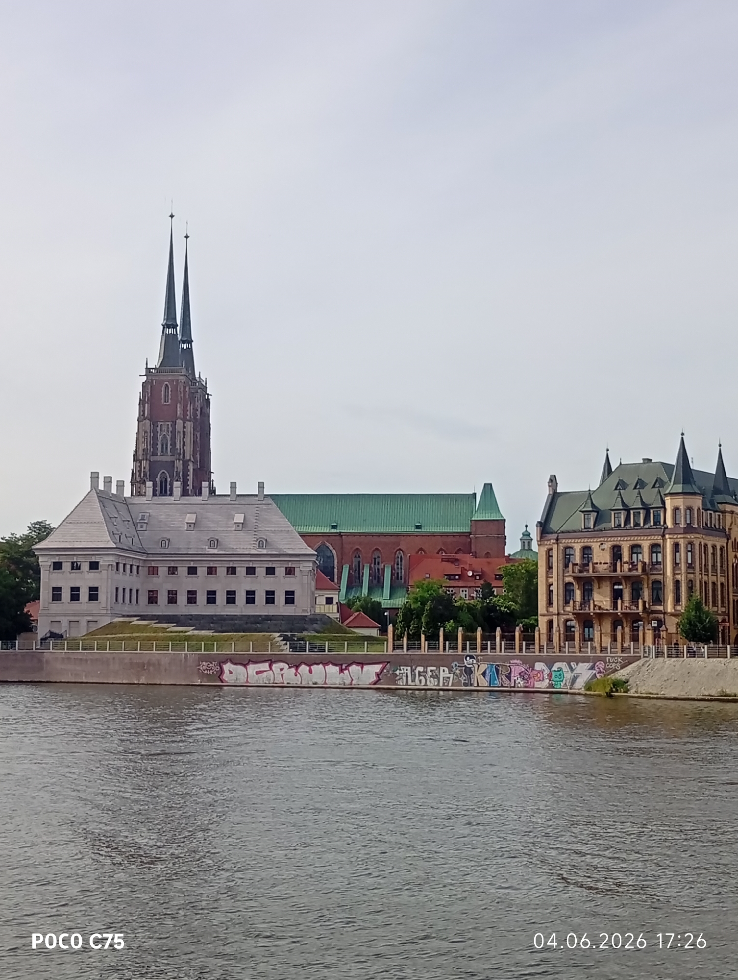 Afternoon river scenes and public art captured in Wrocław