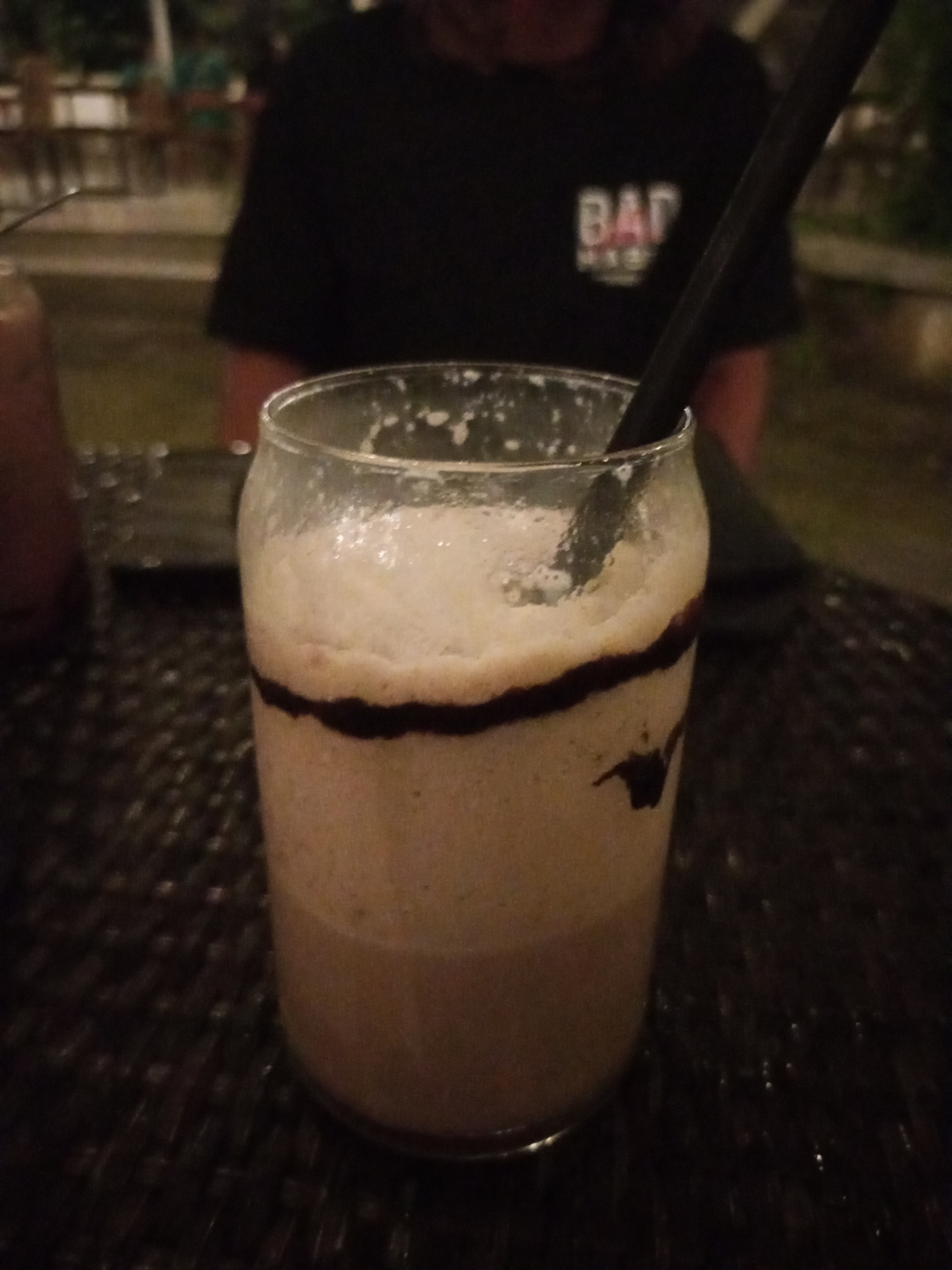 Evening feast at a tropical Kuta restaurant, food and drinks all round