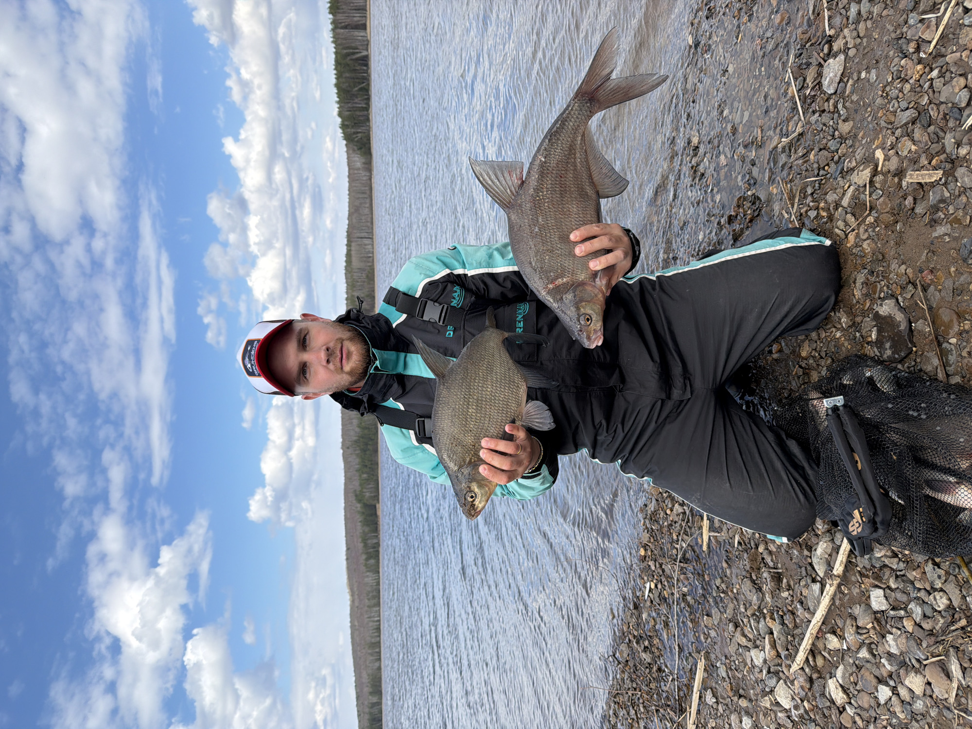 Angler displays catch of two fish in Chaikovsky, Russia
