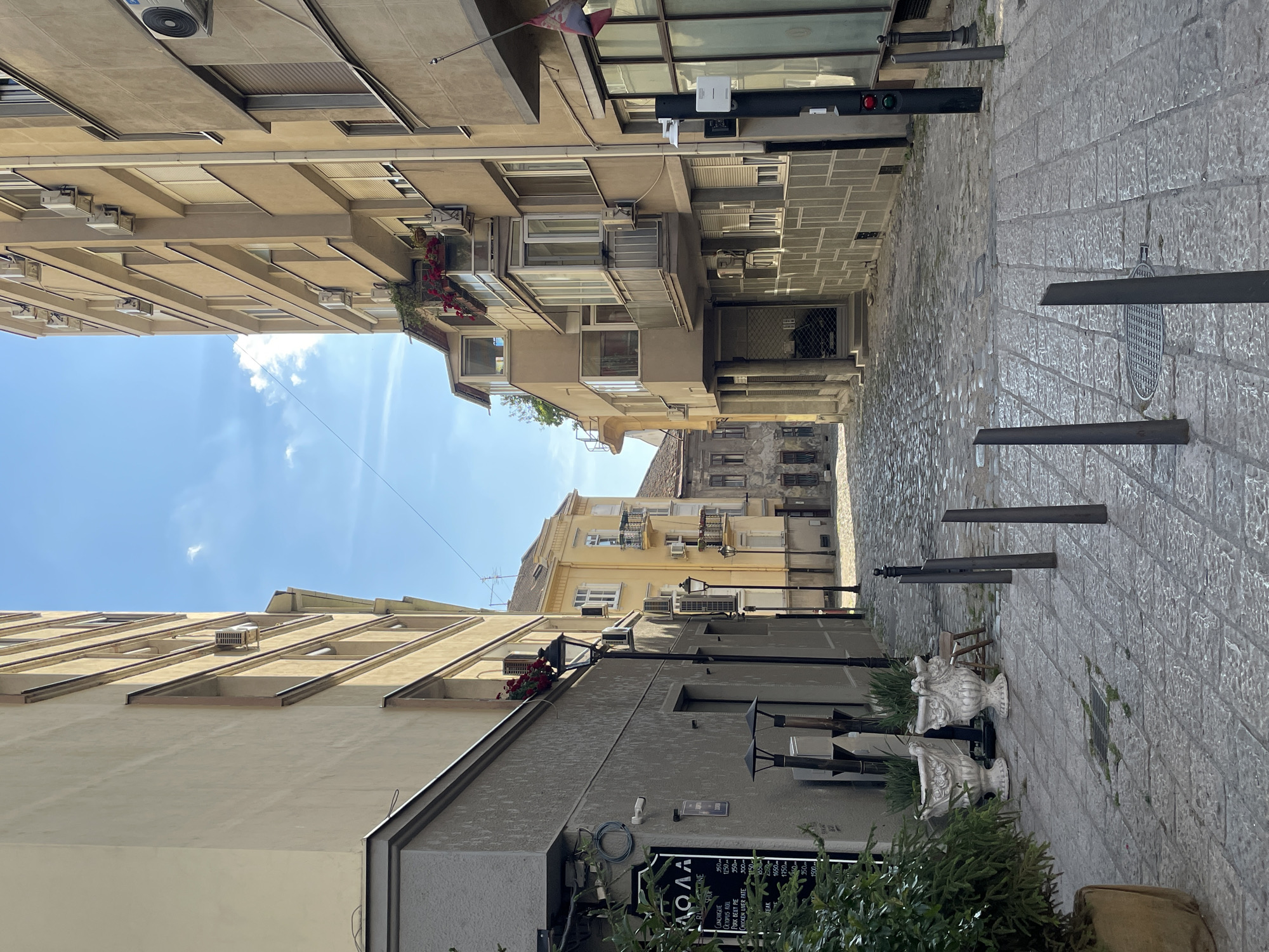 Midday walk through Belgrade's old quarter captures street art, architecture