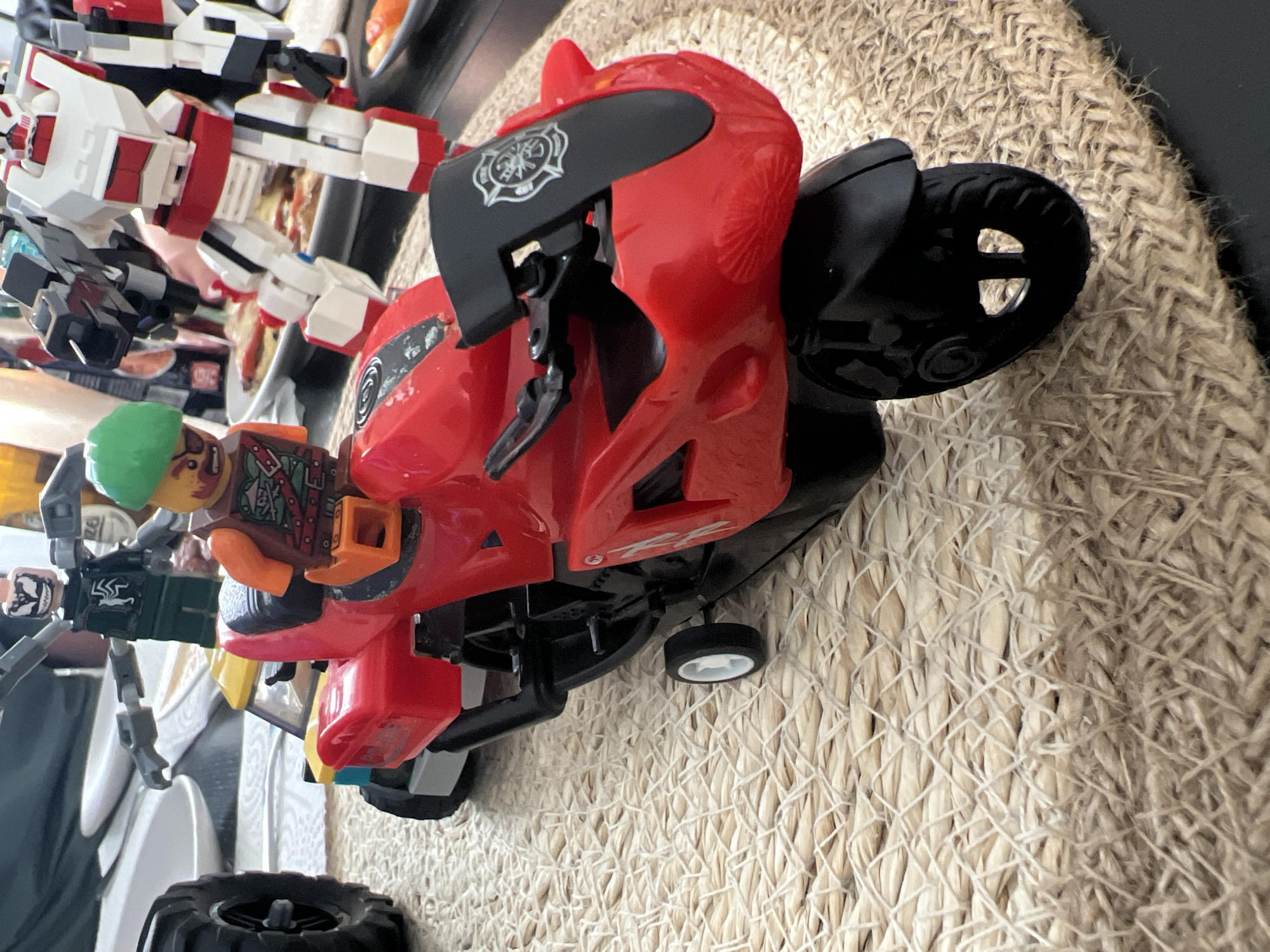 LEGO figures and vehicles staged on a Budapest dining table