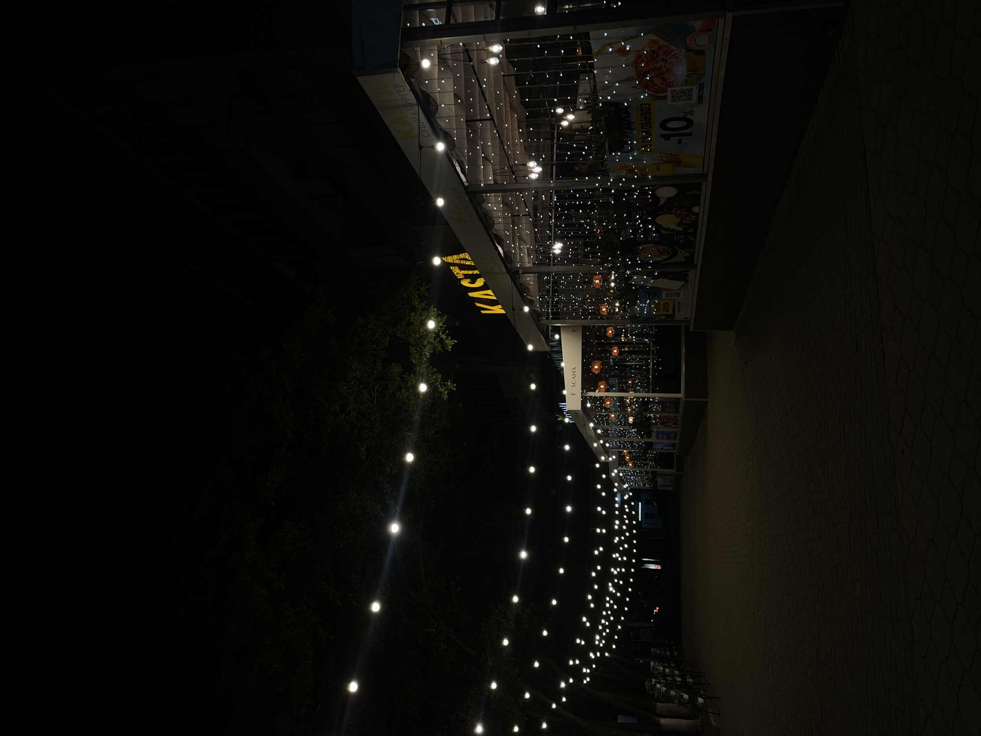 Nighttime scenes captured across illuminated Tiraspol streets and venues
