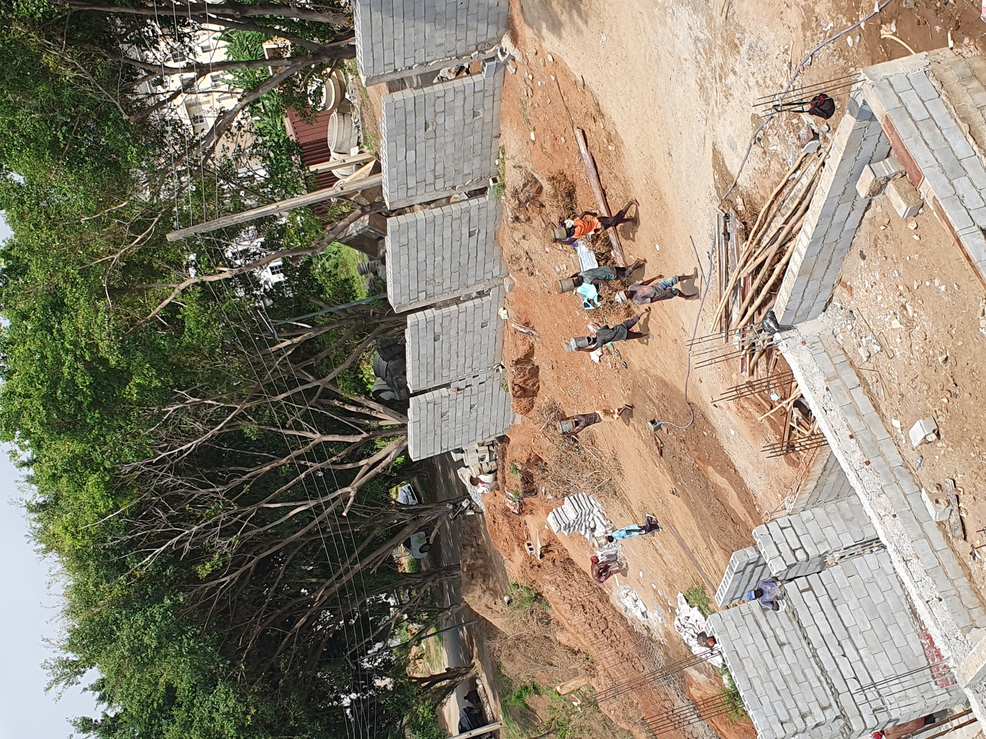 Construction workers build foundations at Abuja site