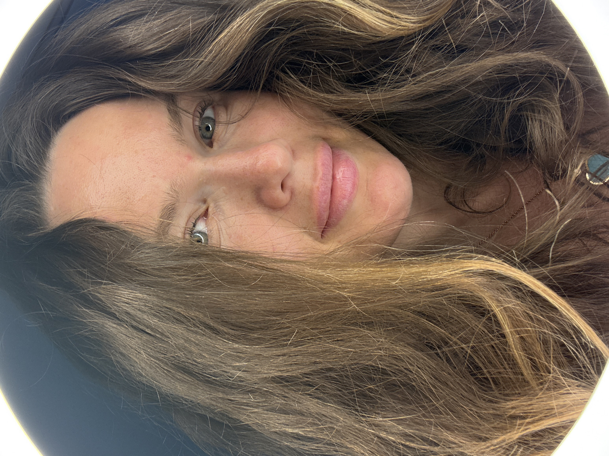 Back-to-back selfies from Dolgoprudny, same evening
