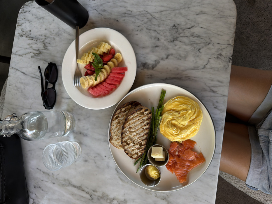 Fruit breakfast served on marble table in Tibubeneng