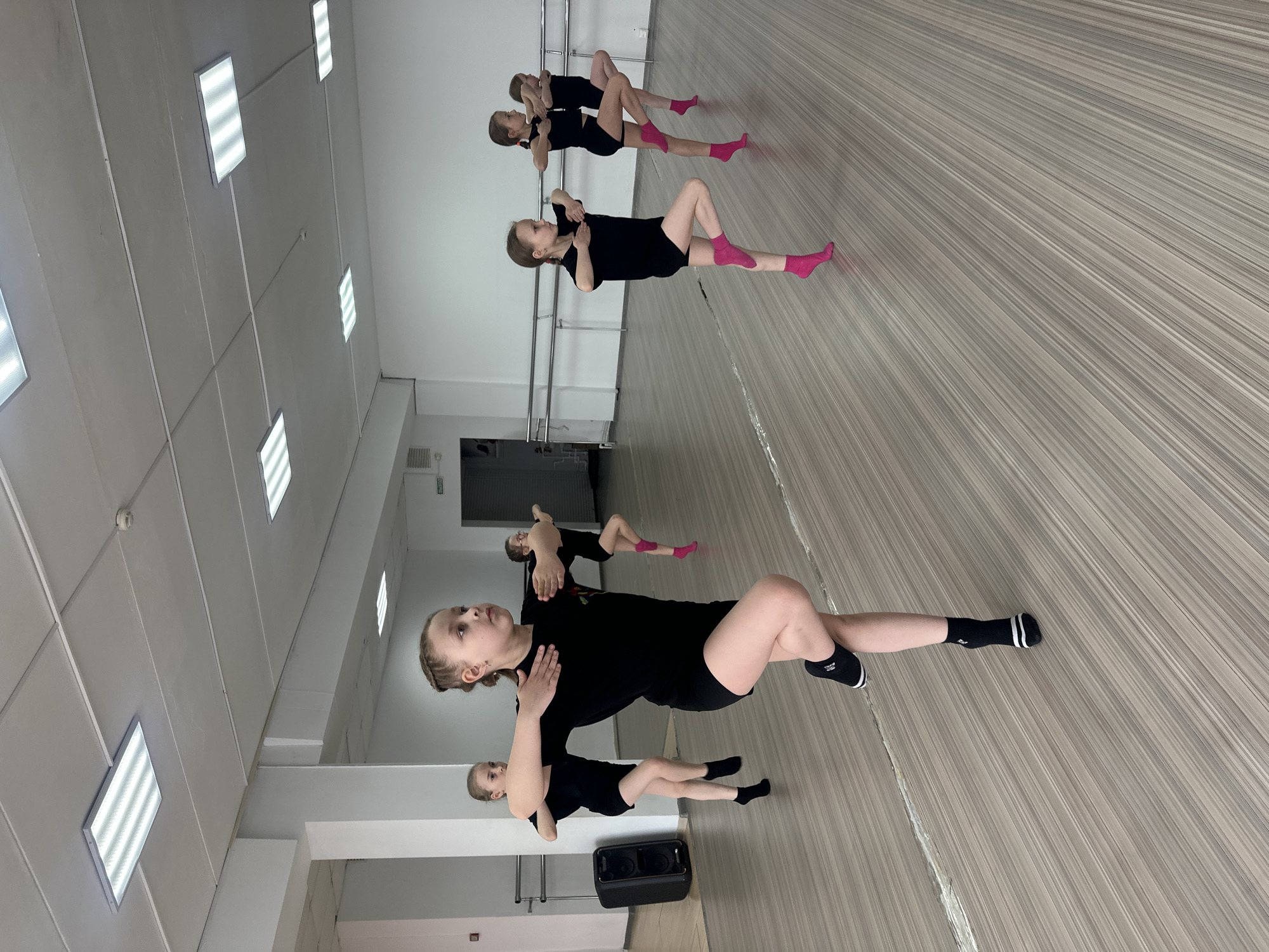 Young dancers practice floor exercises in Votkinsk studio