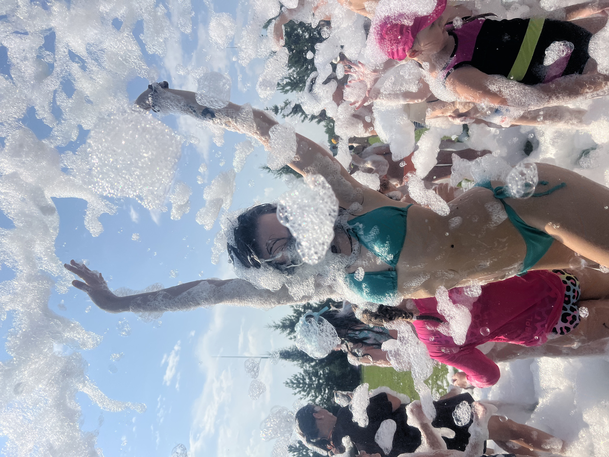 Foam party fun at Емельяновское озеро on a sunny day
