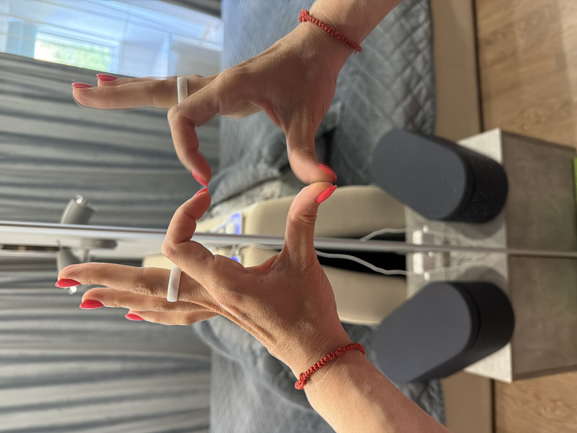 Hands form Z-shape gesture captured in Birobidzhan mirror