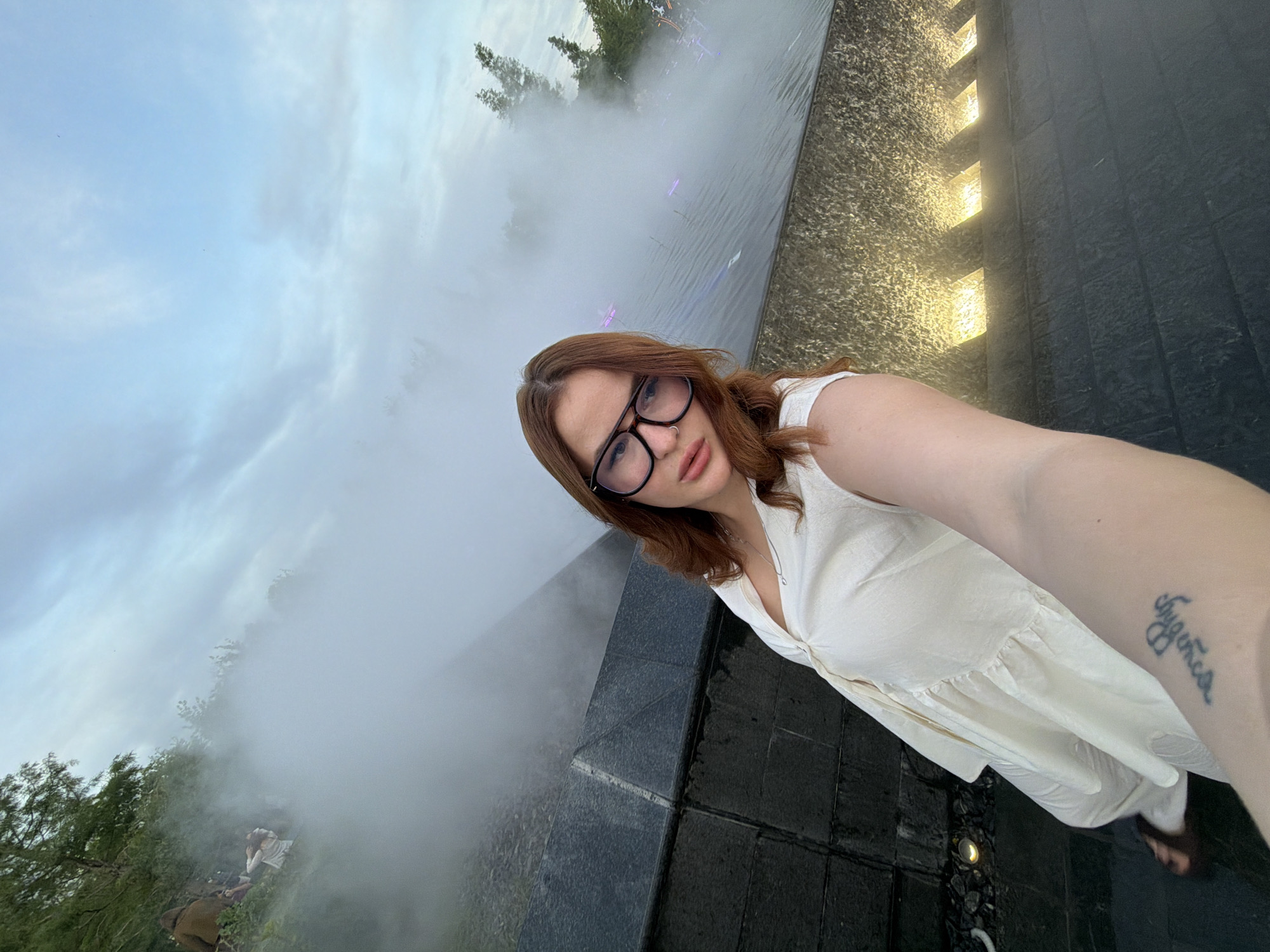 Woman takes selfie amid misty landscape in Krasnodar