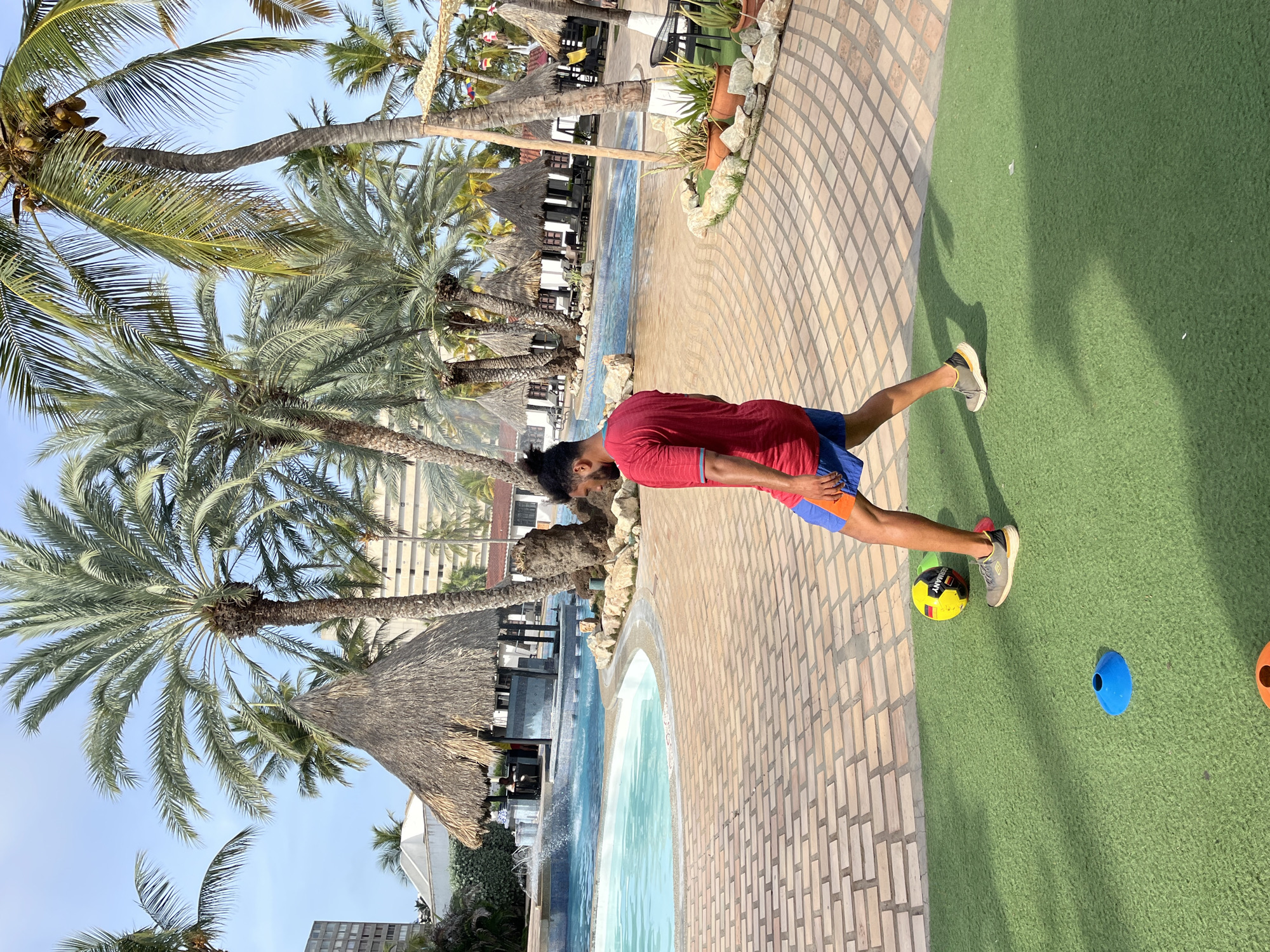 Resort evening in Porlamar: soccer, dancing, and poolside hangs