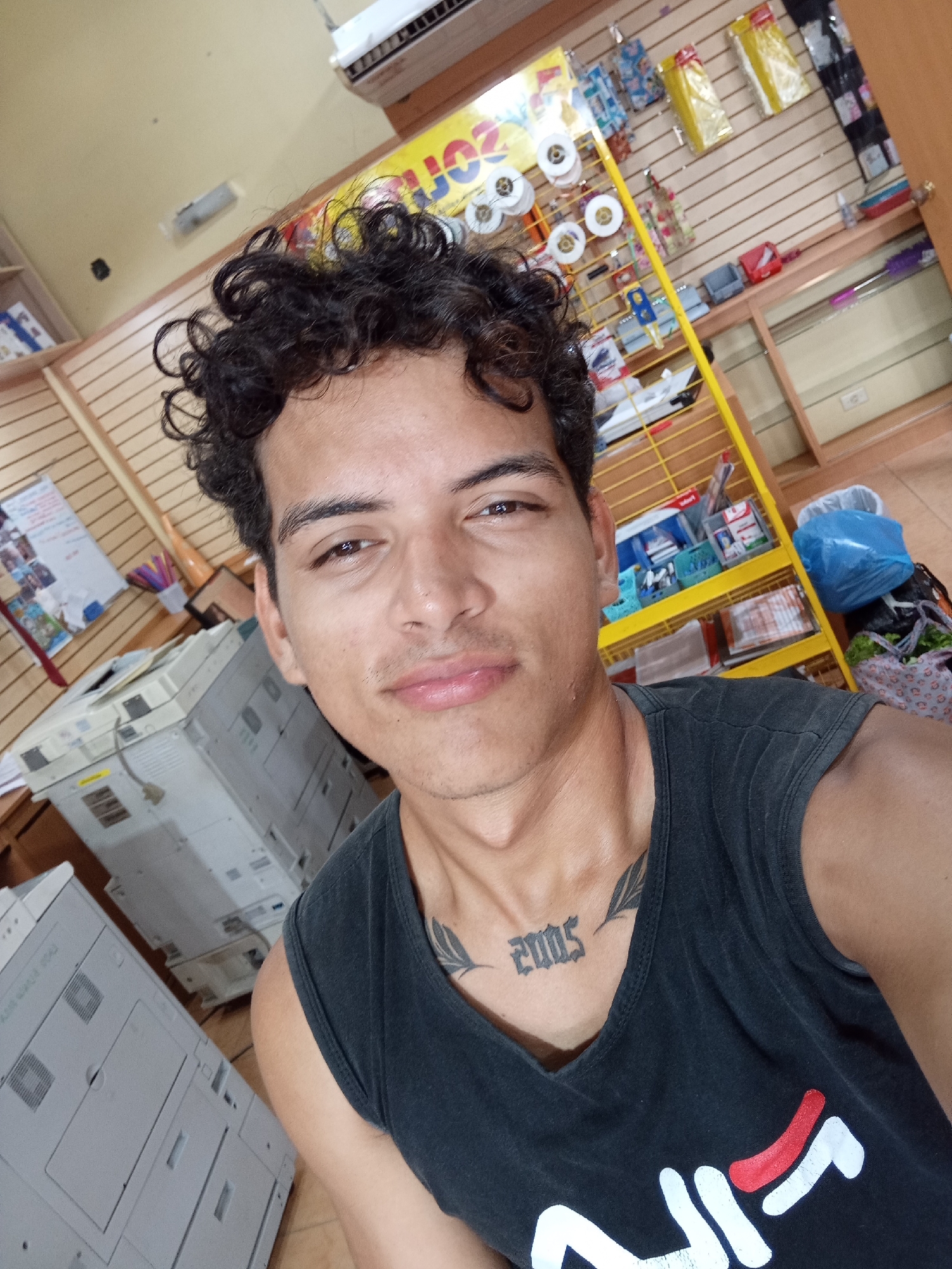 Young man documents afternoon visit to Juan Griego copy center