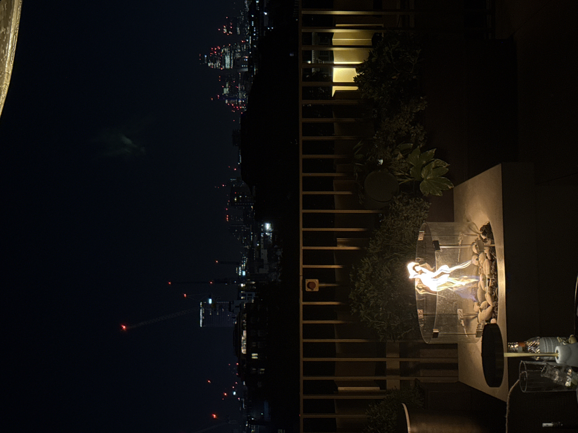 Evening rooftop gathering documented at upscale London venue