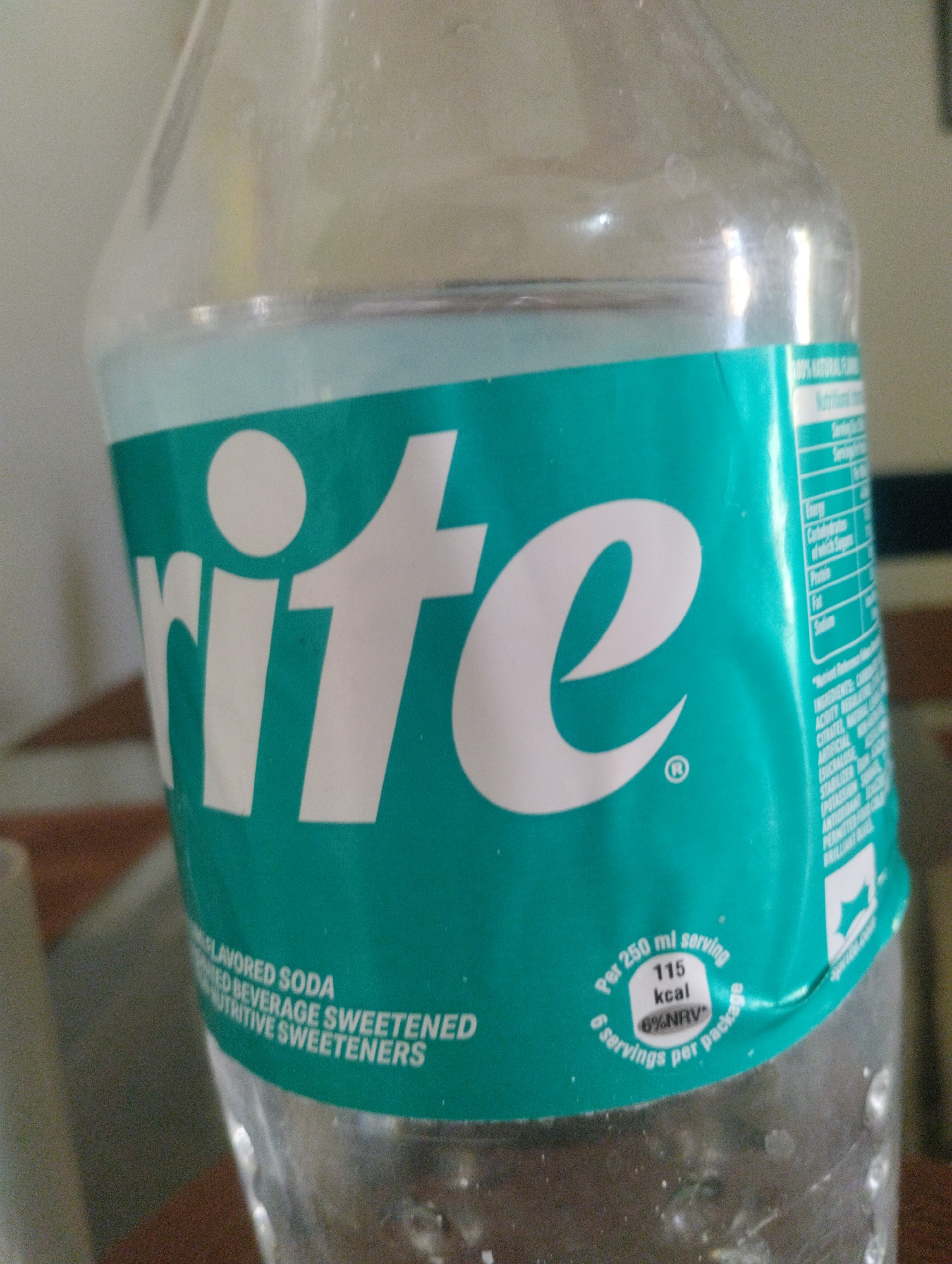 Casual domestic scenes: interiors, textiles, plants, and drink bottles