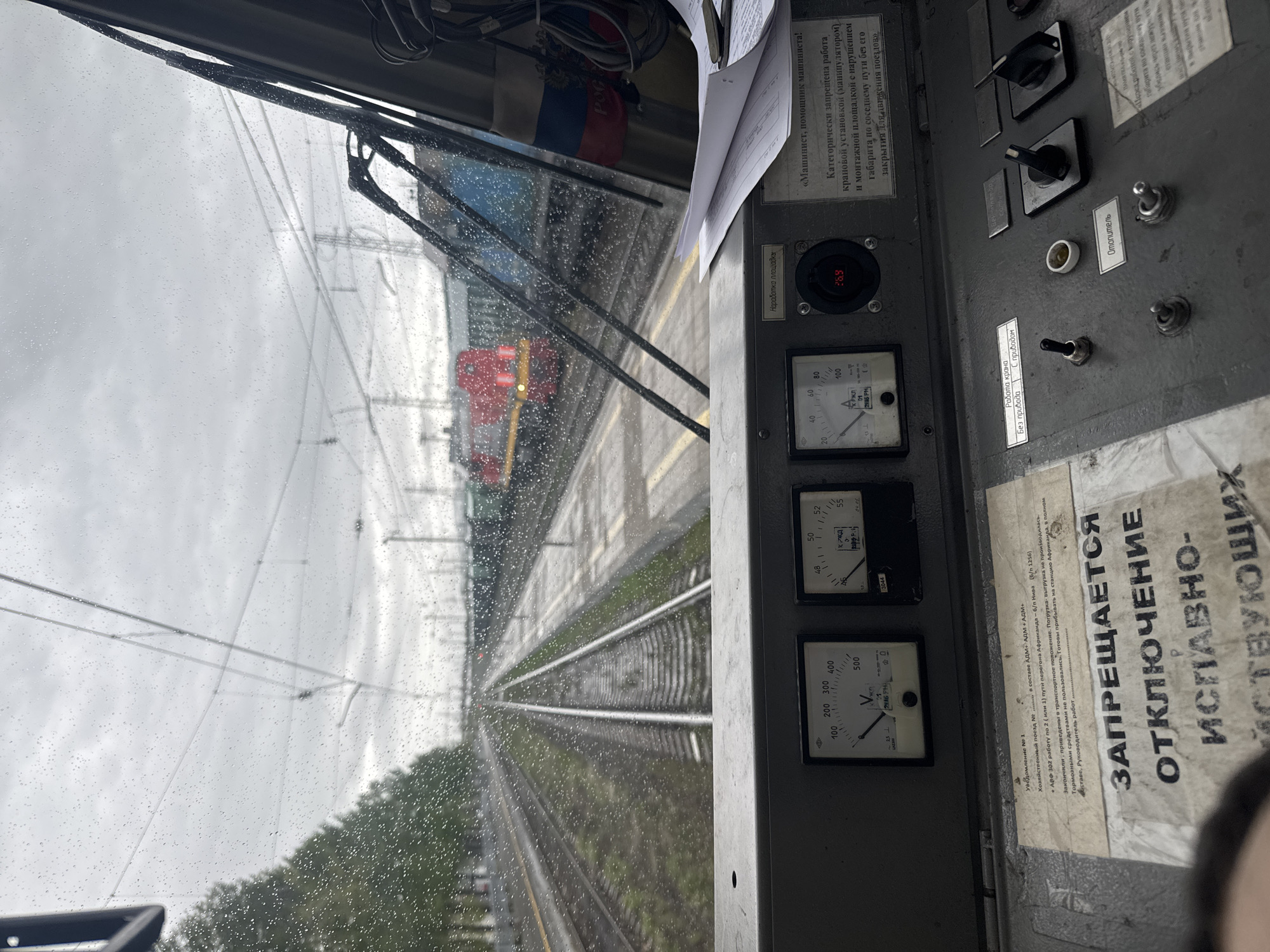 Train operator captures rainy morning view from locomotive in Apatity