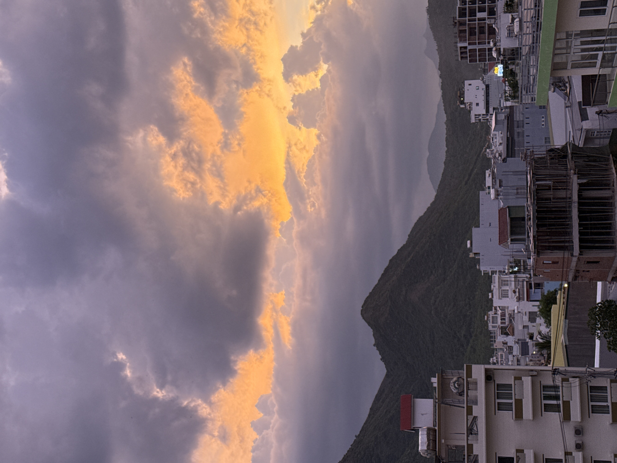 Stormy dusk sky over Nha Trang's coast and cityscape