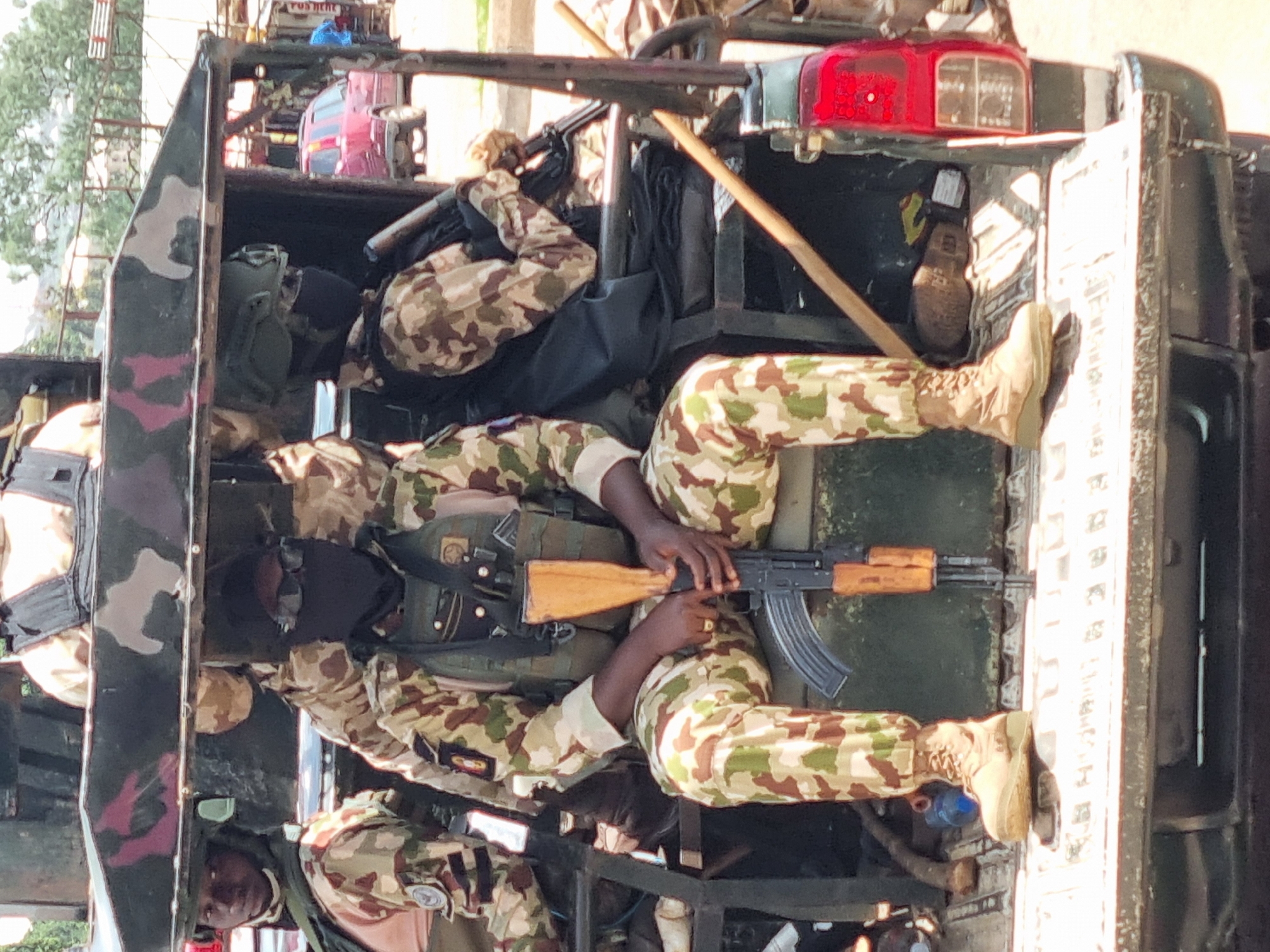 Everyday life across Jos streets, shops, and landmarks