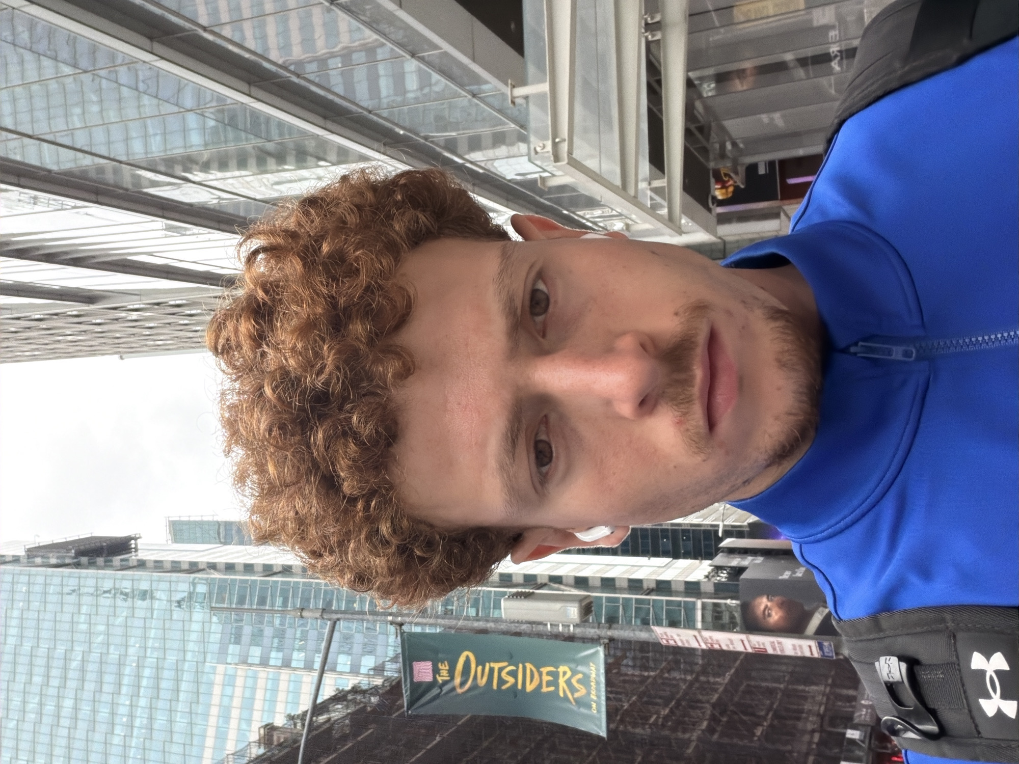 Man photographed near Broadway theater banner in NYC