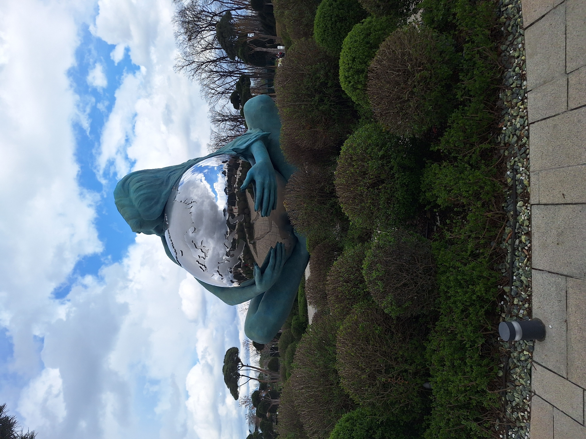 Woman-with-globe statue photographed multiple times in Krasnodar park