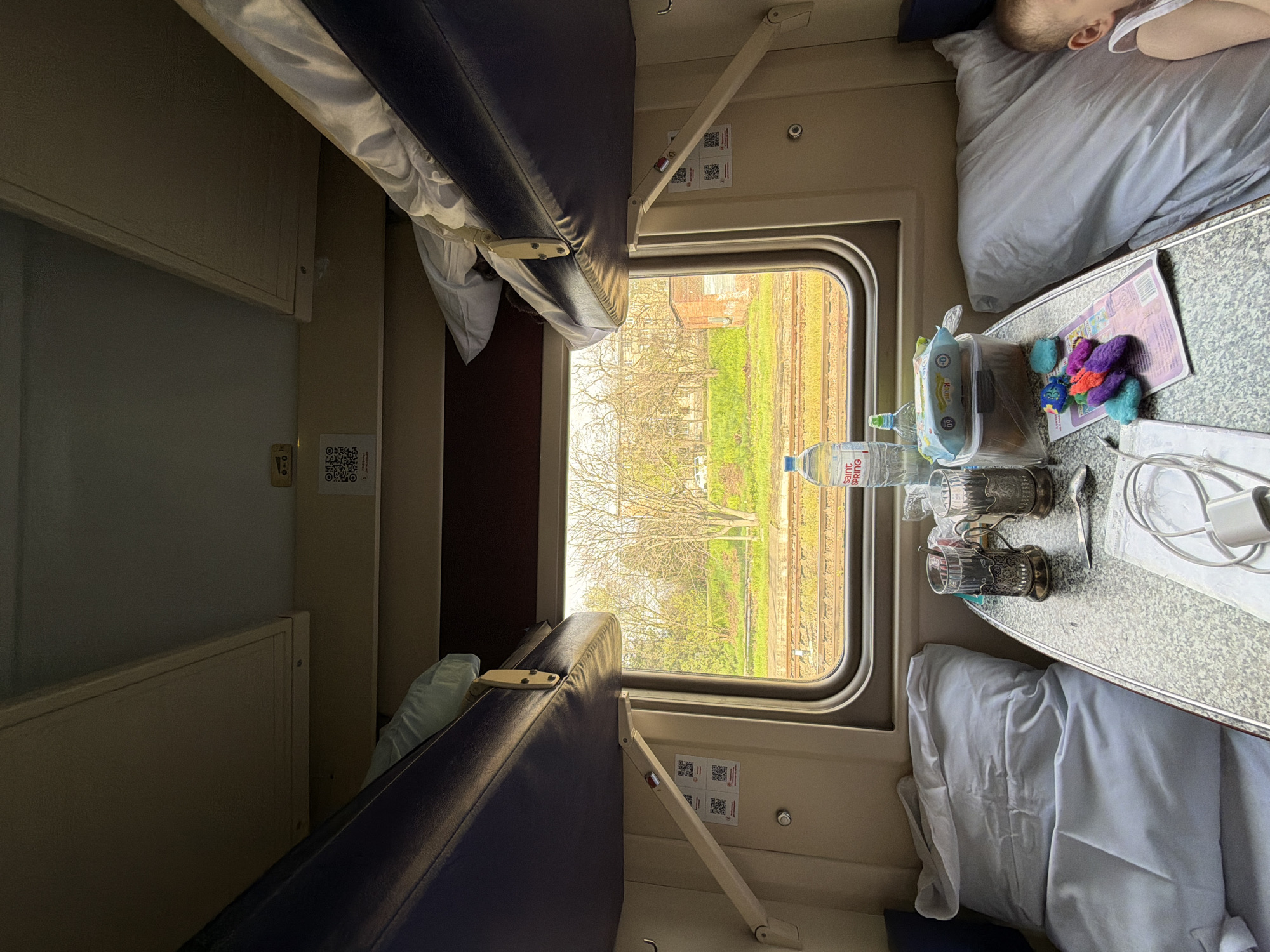 Family train journey captured in early morning Krasnodar compartment