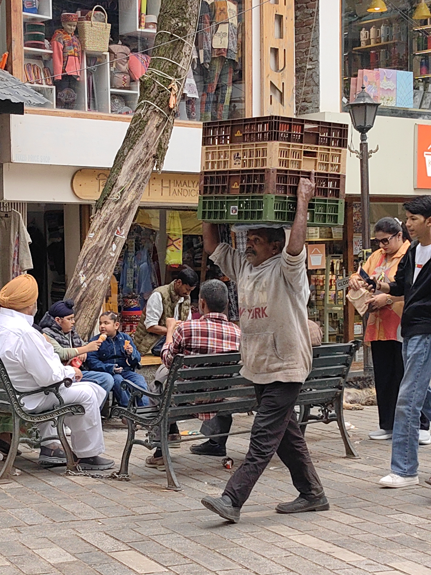 Morning market bustle in Manali's streets, food stalls and all