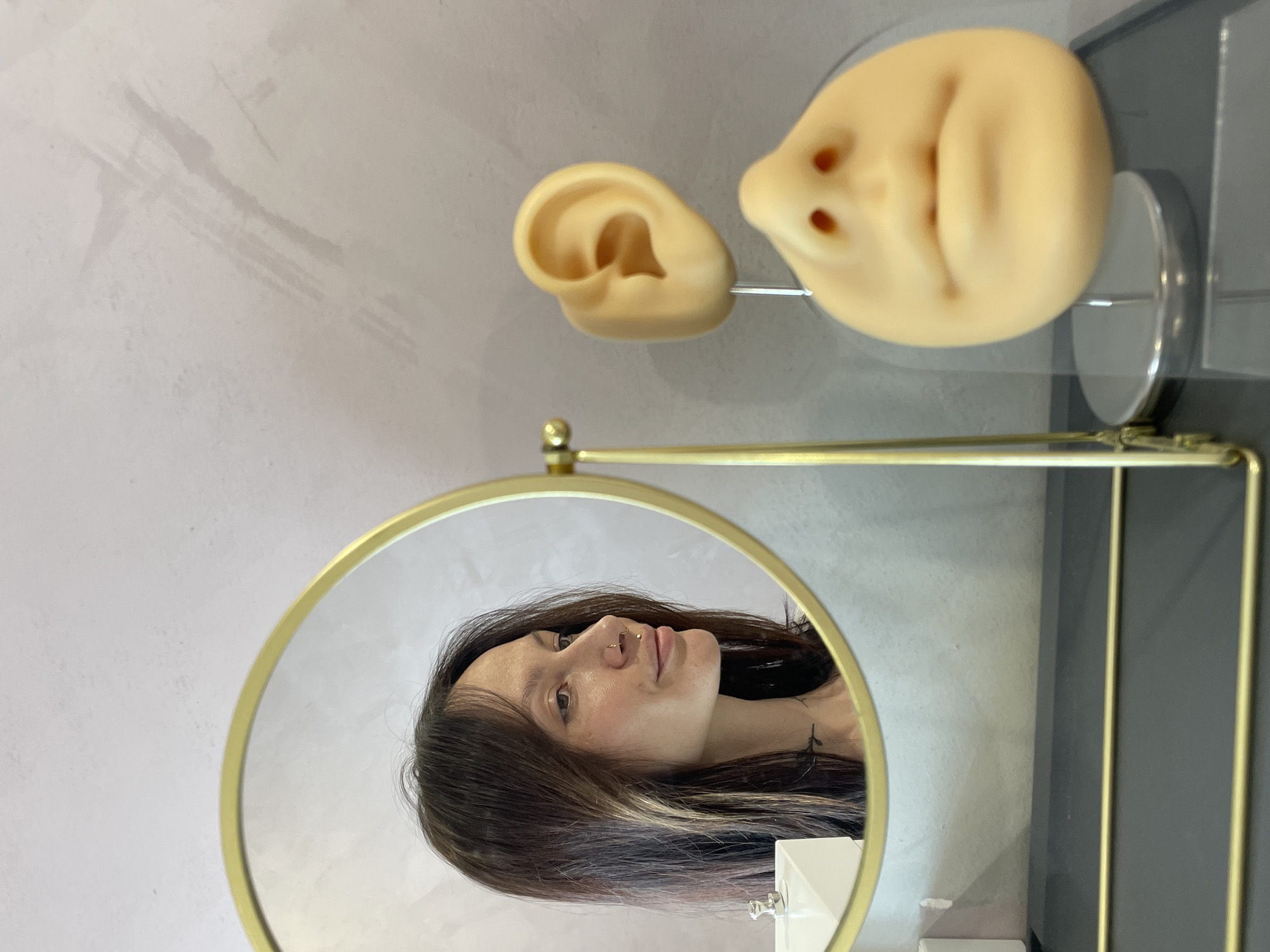 Woman takes selfies near prosthetics display in Izhevsk