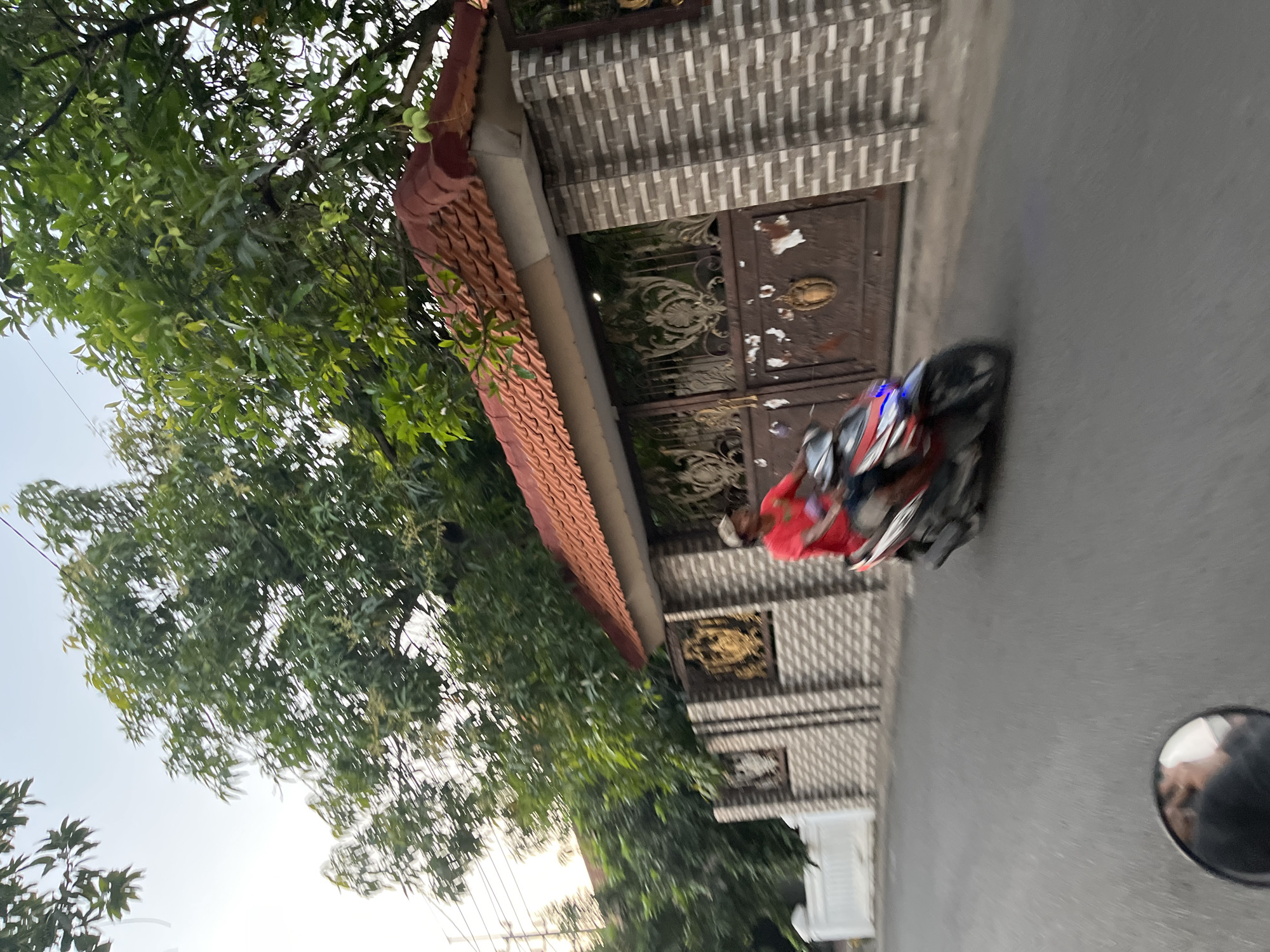 Morning street life across two East Java neighborhoods